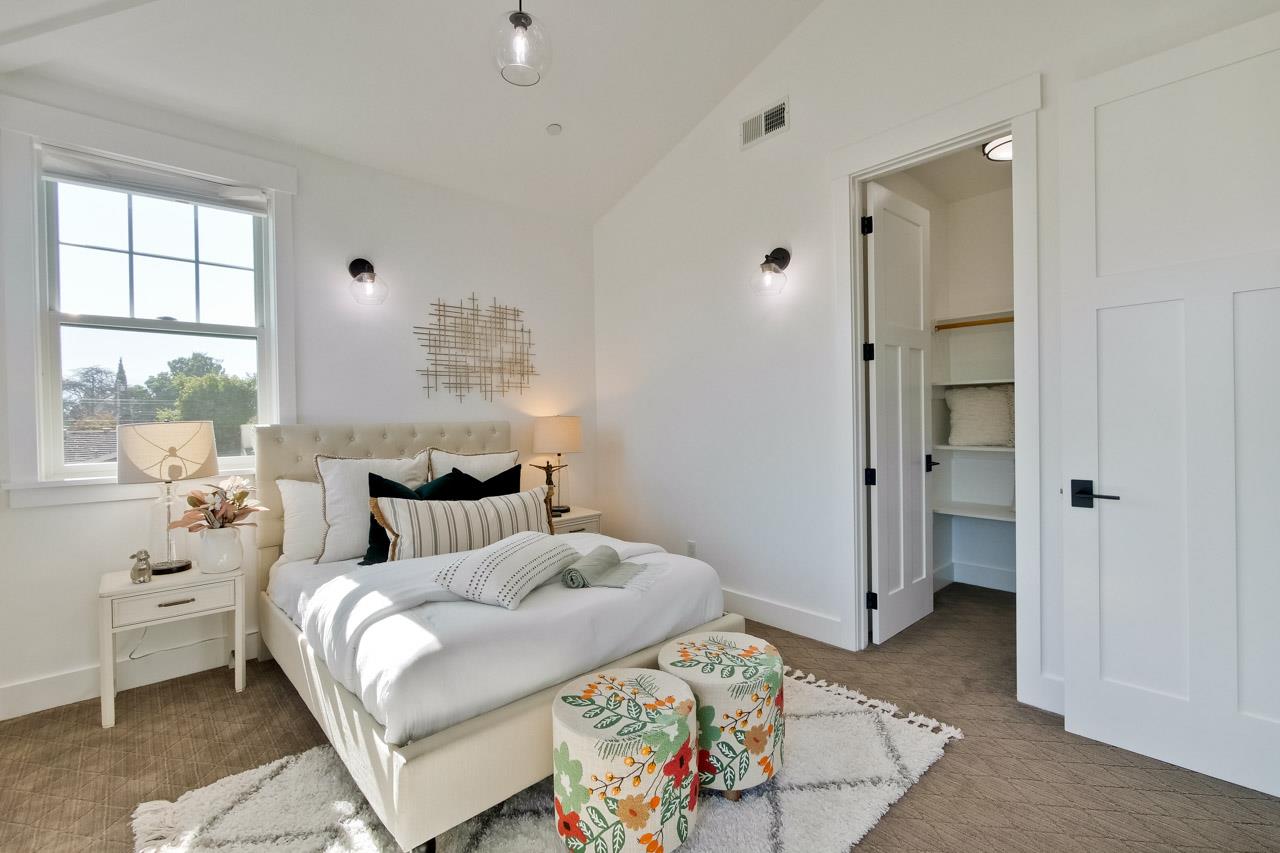 10326 Prune Tree Lane Cupertino, CA 95014 - Photo 40 of 95 a bedroom with a bed and a window