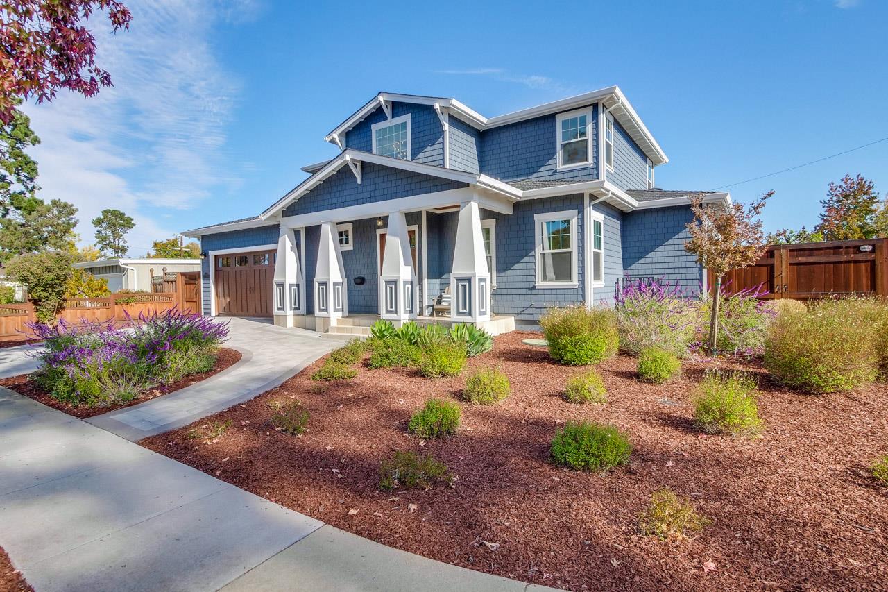10326 Prune Tree Lane Cupertino, CA 95014 - Photo 45 of 95 a front view of a house with a garden
