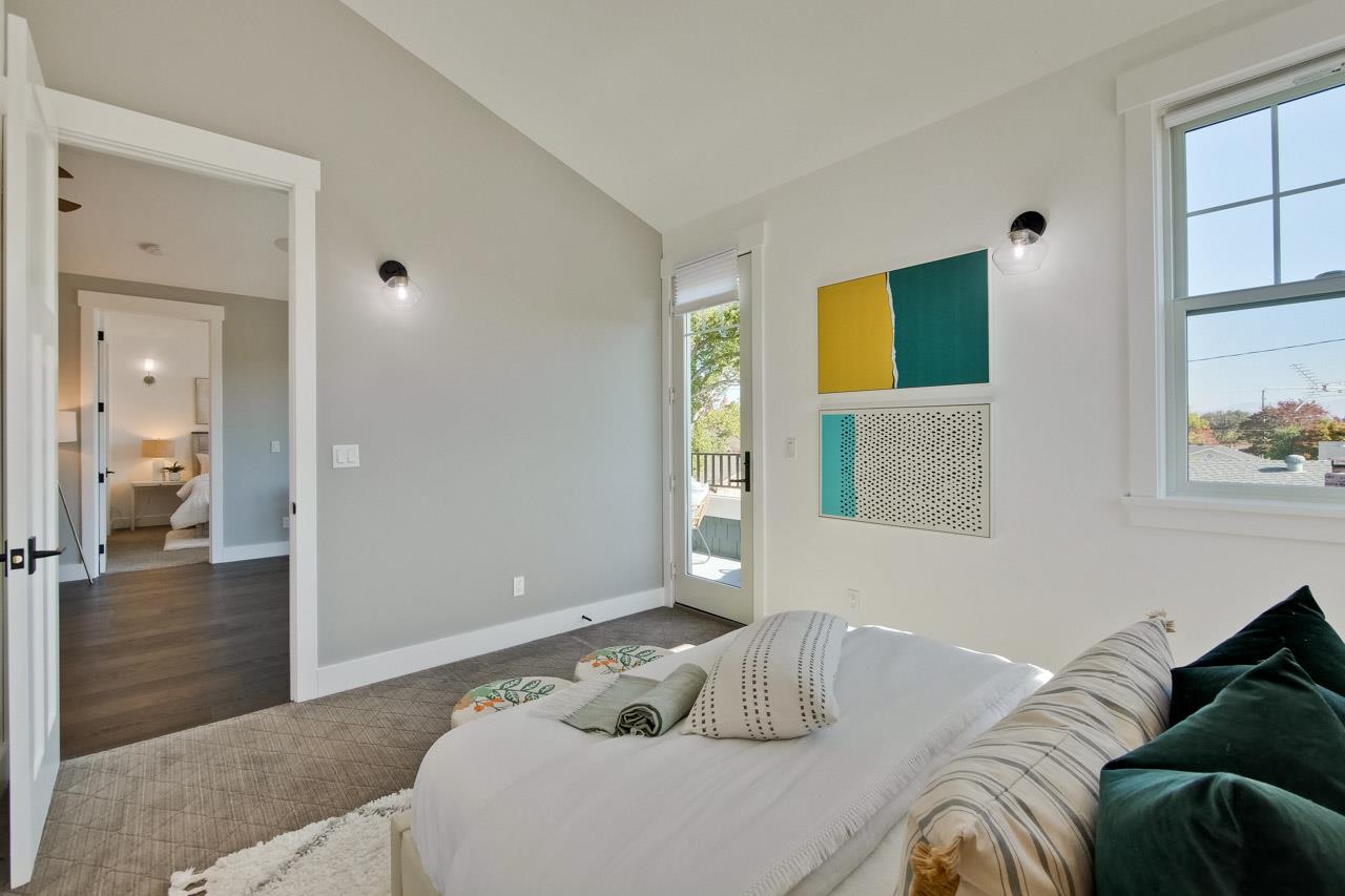 10326 Prune Tree Lane Cupertino, CA 95014 - Photo 48 of 95 a bedroom with a bed and a window