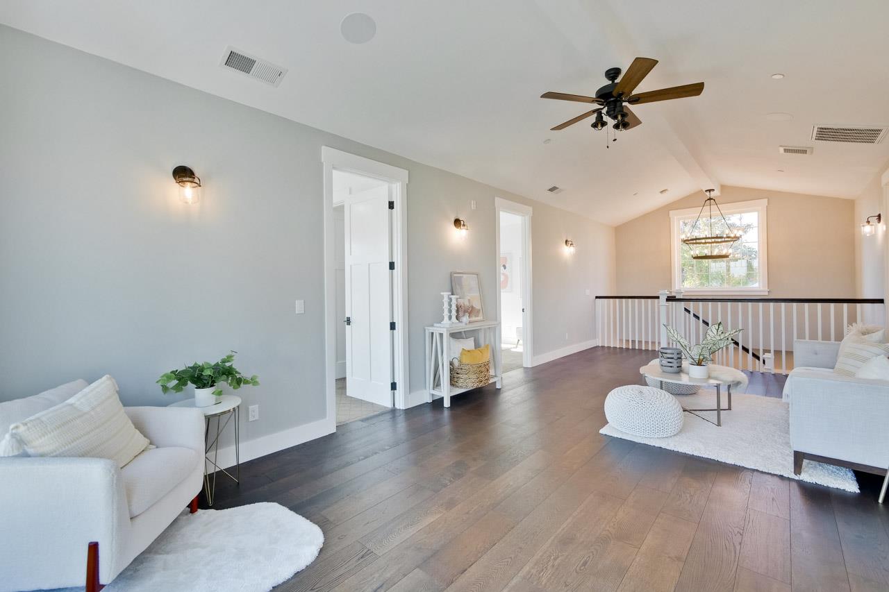 10326 Prune Tree Lane Cupertino, CA 95014 - Photo 72 of 95 a living room with furniture and a wooden floor