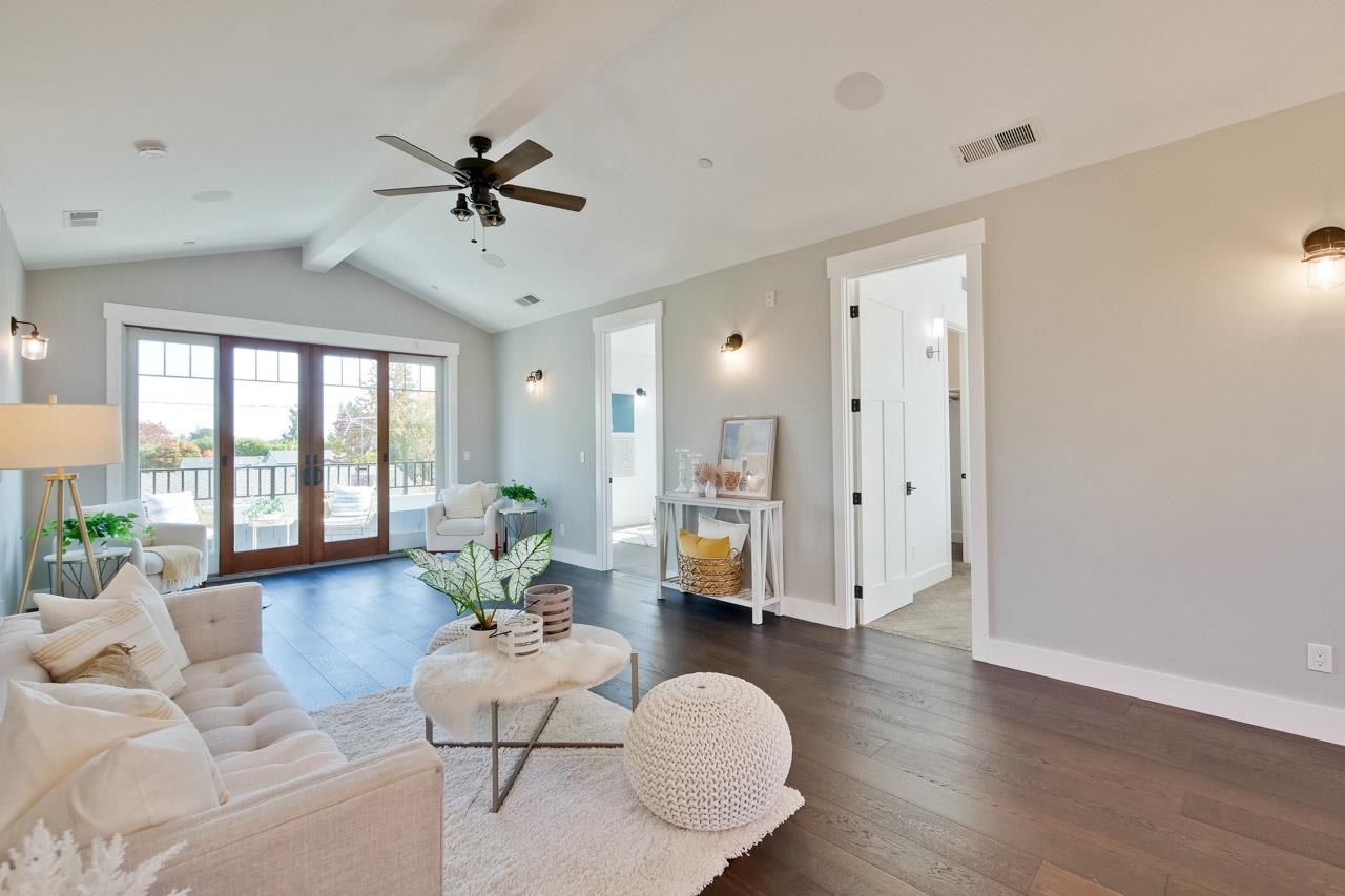 10326 Prune Tree Lane Cupertino, CA 95014 - Photo 73 of 95 a living room with furniture and a large window