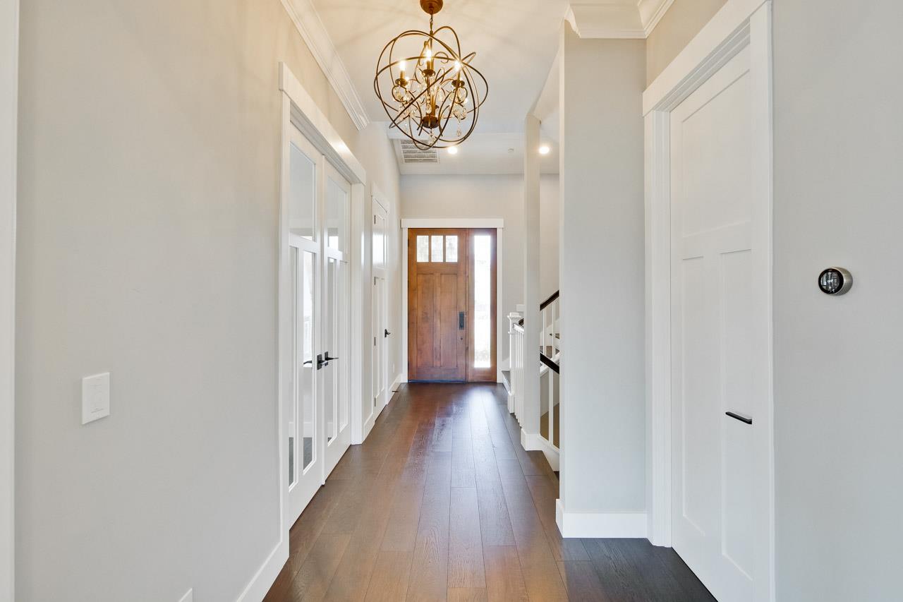 10326 Prune Tree Lane Cupertino, CA 95014 - Photo 75 of 95 a view of a hallway with wooden floor
