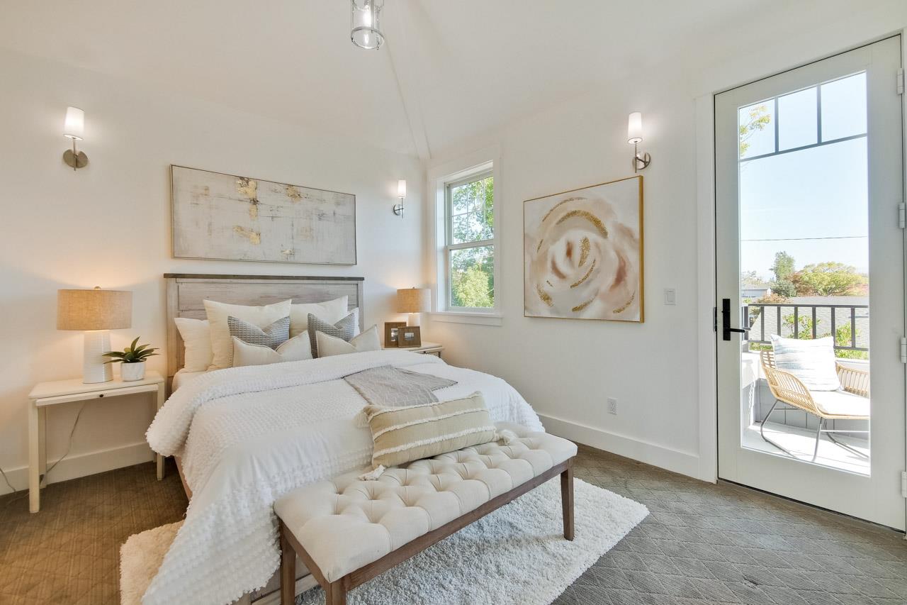 10326 Prune Tree Lane Cupertino, CA 95014 - Photo 77 of 95 a bedroom with a large bed and a window
