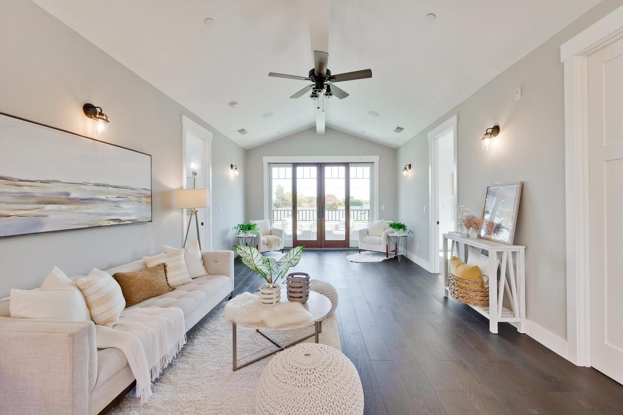 10326 Prune Tree Lane Cupertino, CA 95014 - Photo 81 of 95 a living room with furniture and a wooden floor