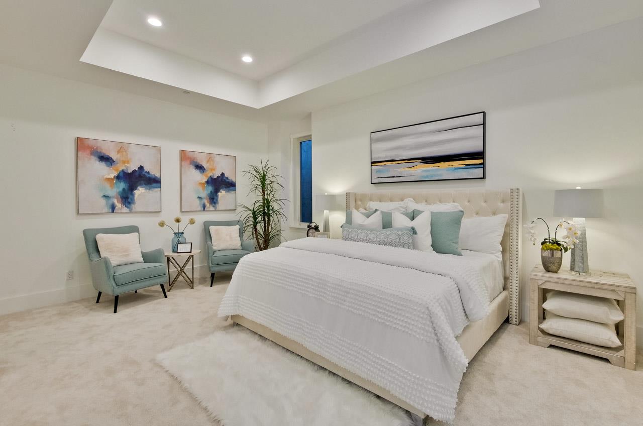 10326 Prune Tree Lane Cupertino, CA 95014 - Photo 84 of 95 a bedroom with a bed and a desk