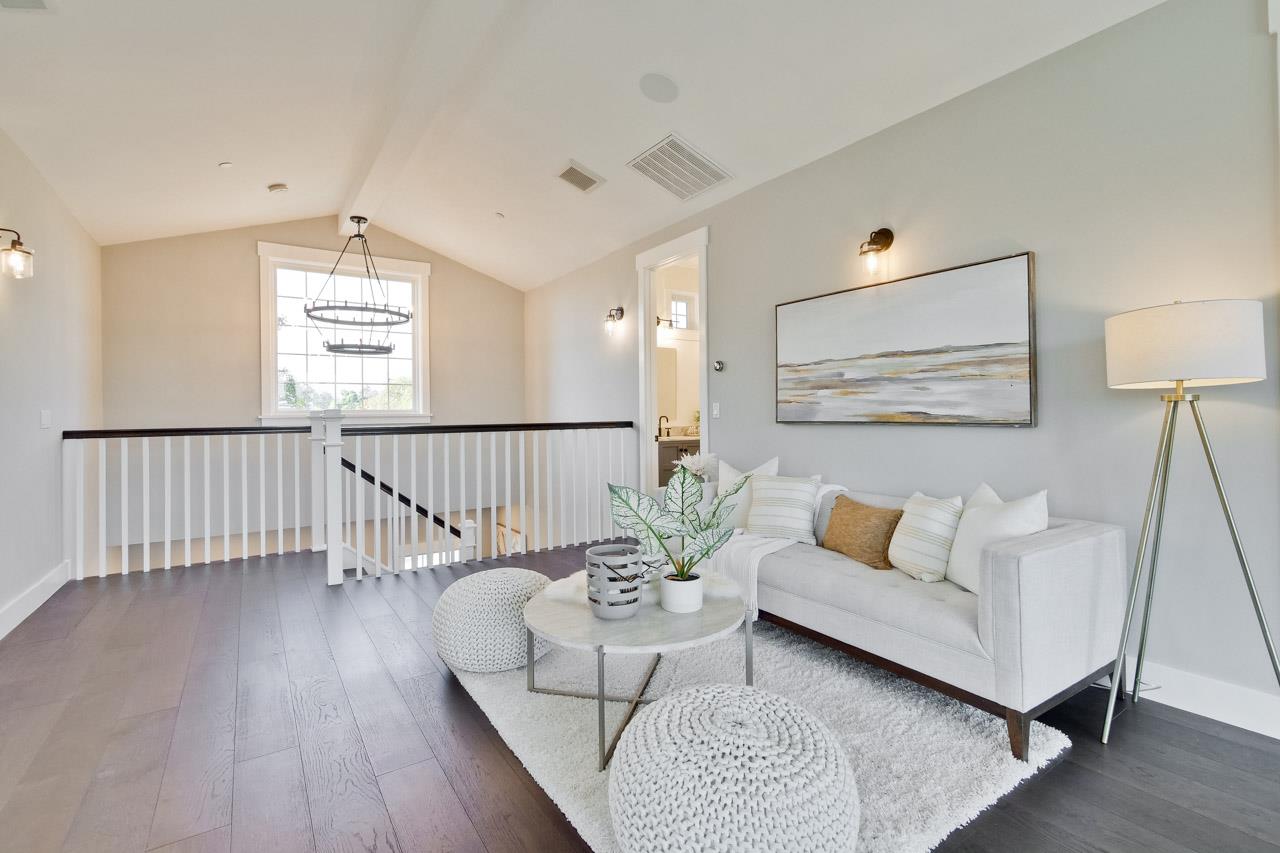 10326 Prune Tree Lane Cupertino, CA 95014 - Photo 90 of 95 a living room with furniture and wooden floor