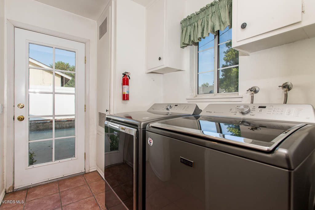 2460 Fitzgerald Road Simi Valley, CA 93065 - Photo 17 of 35 a utility room with sink dryer and washer