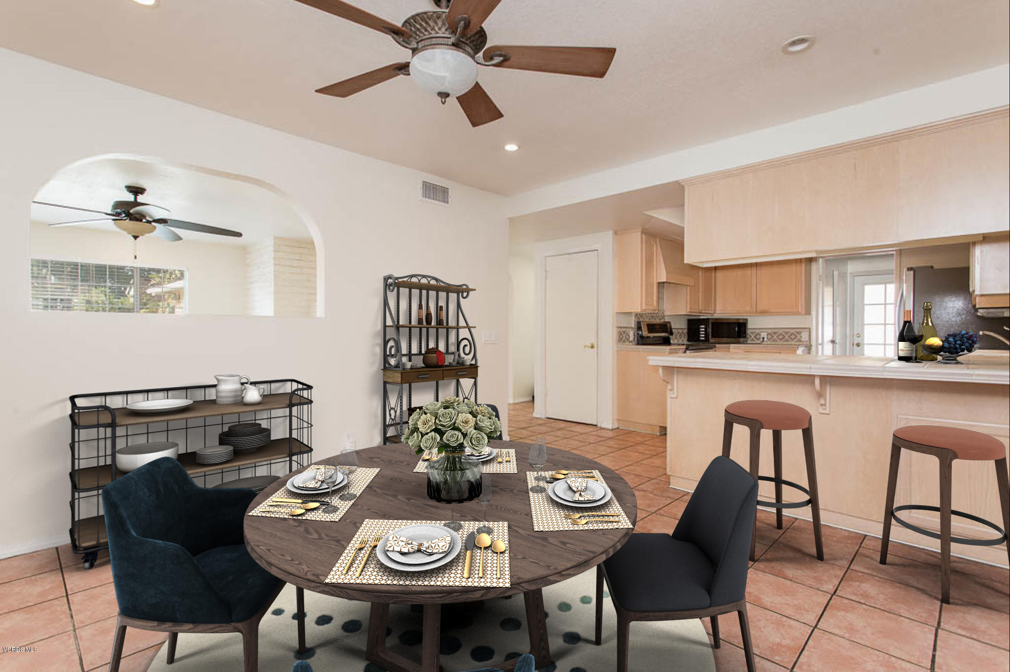 2460 Fitzgerald Road Simi Valley, CA 93065 - Photo 9 of 35 a view of a dining room with furniture and a kitchen