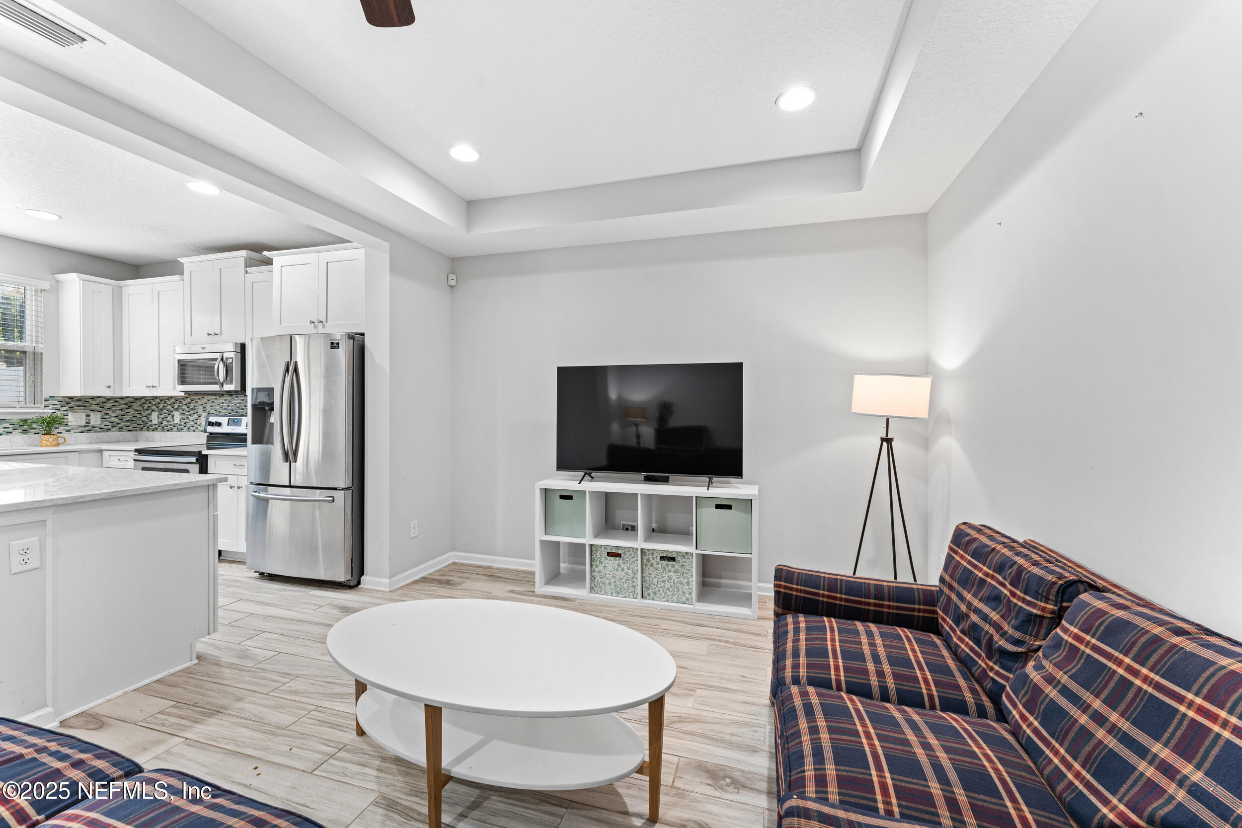 245 Richmond Drive St. Johns, FL 32259 - Photo 3 of 18 a living room with furniture and a flat screen tv