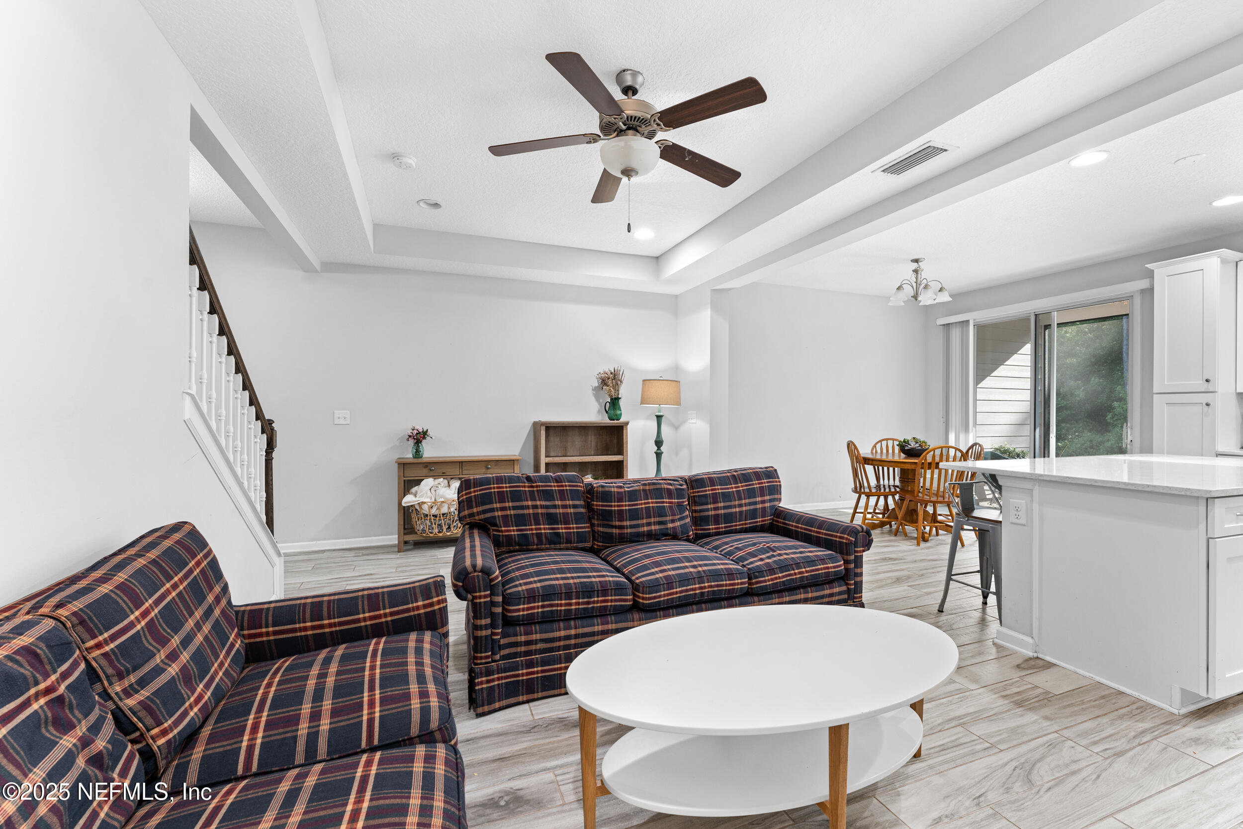 245 Richmond Drive St. Johns, FL 32259 - Photo 4 of 18 a living room with furniture a table and chair with wooden floor