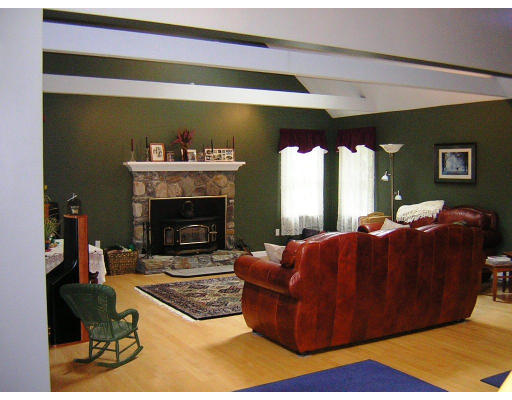 24 Sassawanna Road Rutland, MA 01543 - Photo 13 of 14 a living room with furniture rug and a fireplace
