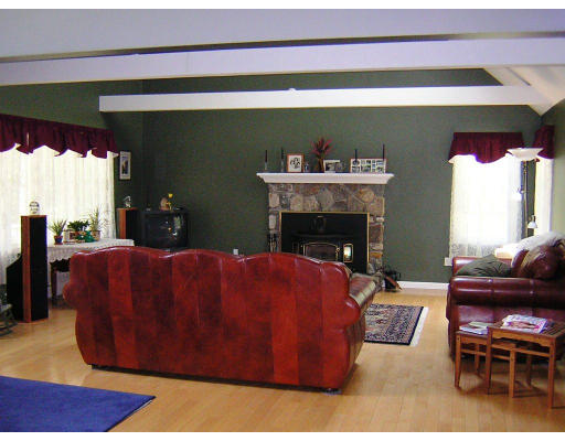 24 Sassawanna Road Rutland, MA 01543 - Photo 5 of 14 a living room with furniture and a fireplace