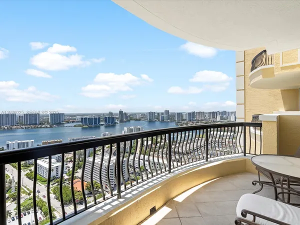 a view of balcony with furniture