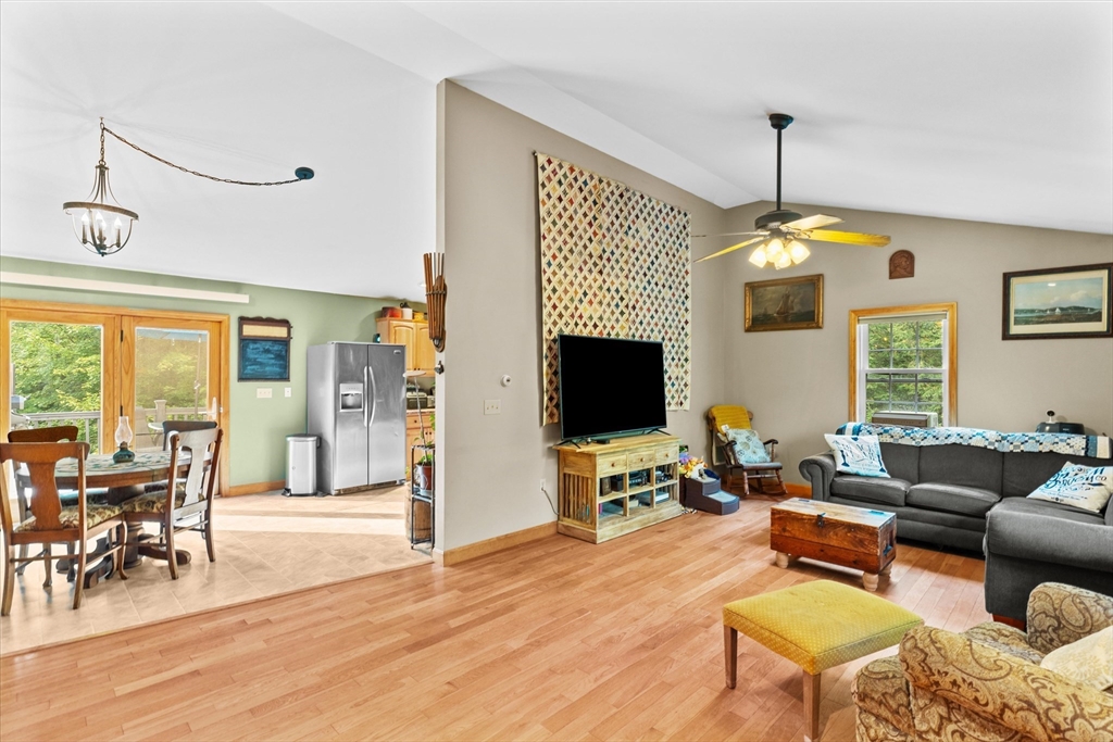 4109 South Athol Road Athol, MA 01331 - Photo 6 of 38 a living room with furniture a fireplace and a flat screen tv