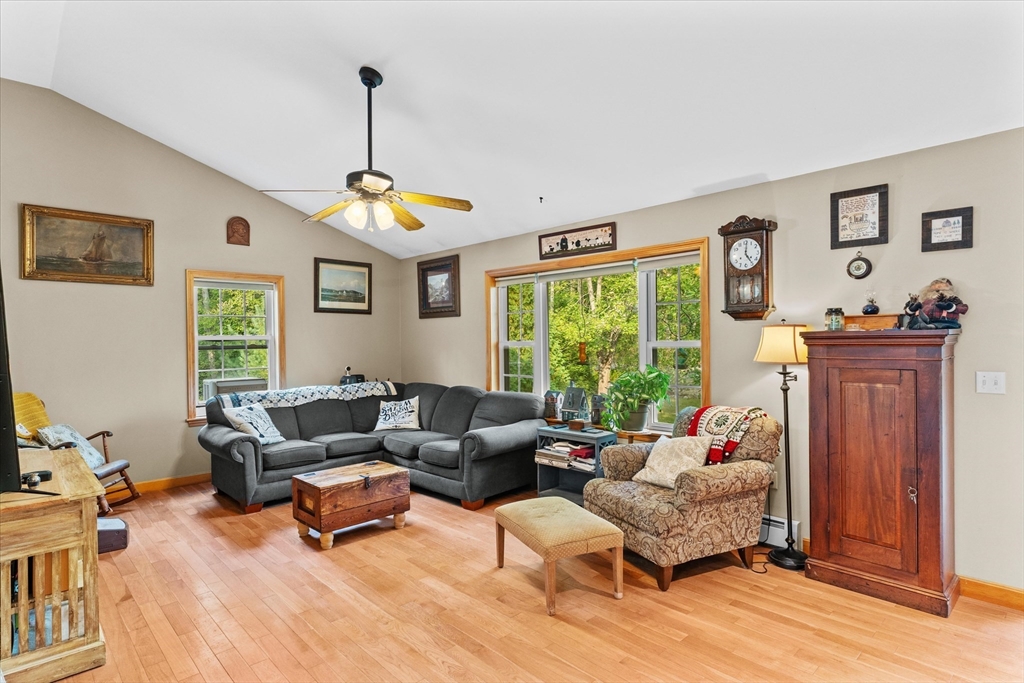 4109 South Athol Road Athol, MA 01331 - Photo 8 of 38 a living room with furniture and a window