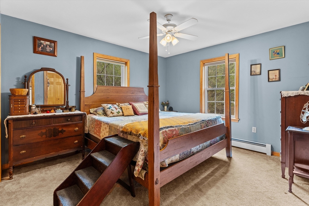 4109 South Athol Road Athol, MA 01331 - Photo 10 of 38 a bed room with a bed and a dresser