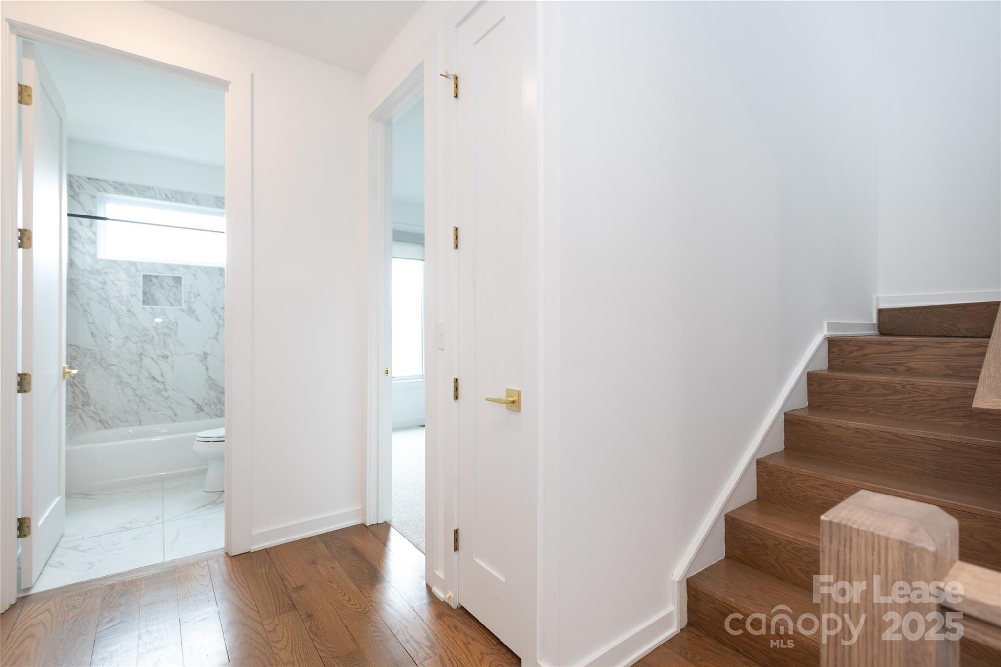 2649 Shenandoah Avenue Charlotte, NC 28205 - Photo 12 of 37 a view of an entryway with wooden floor