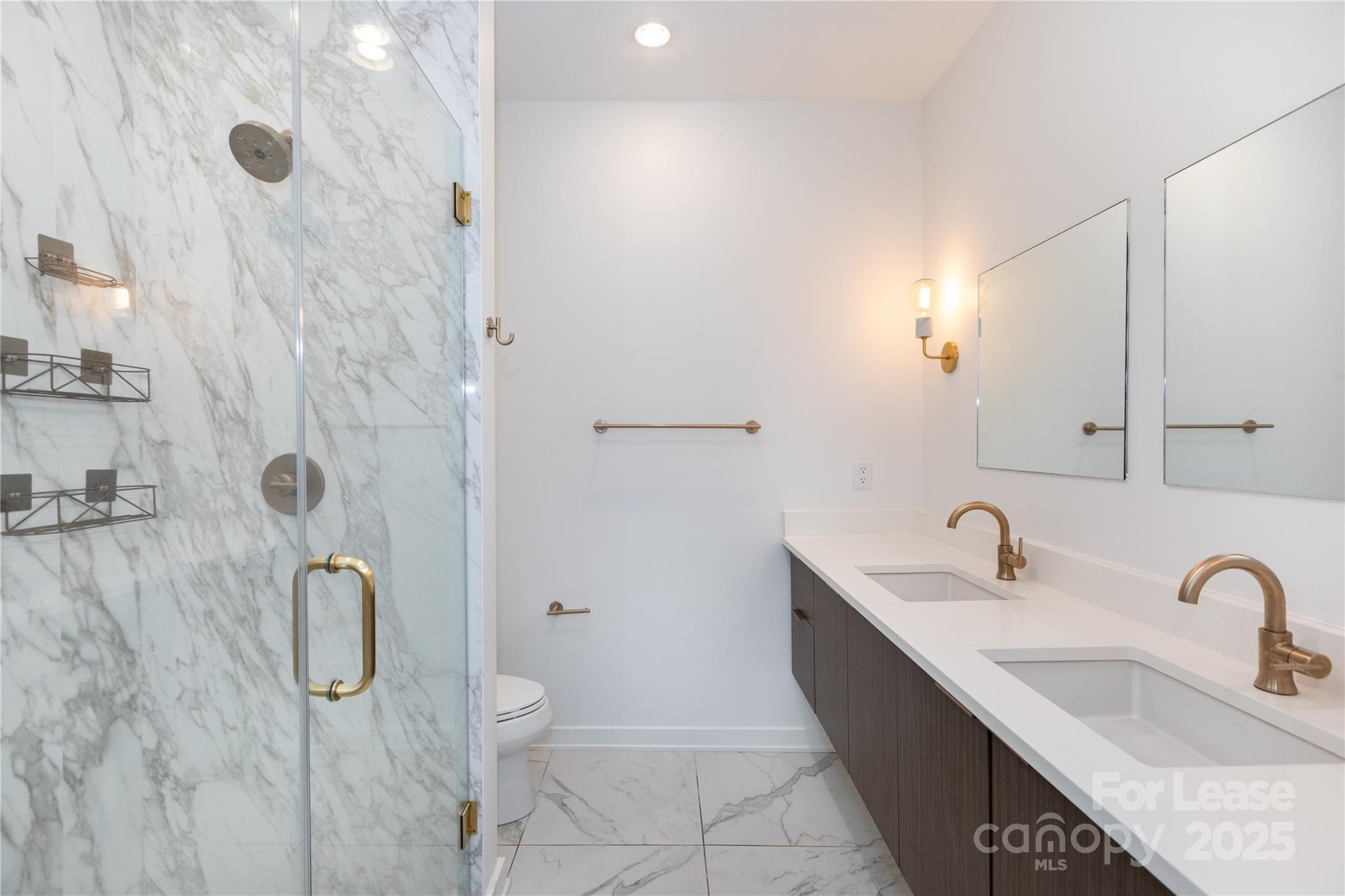 2649 Shenandoah Avenue Charlotte, NC 28205 - Photo 23 of 37 a bathroom with a double vanity sink and mirror