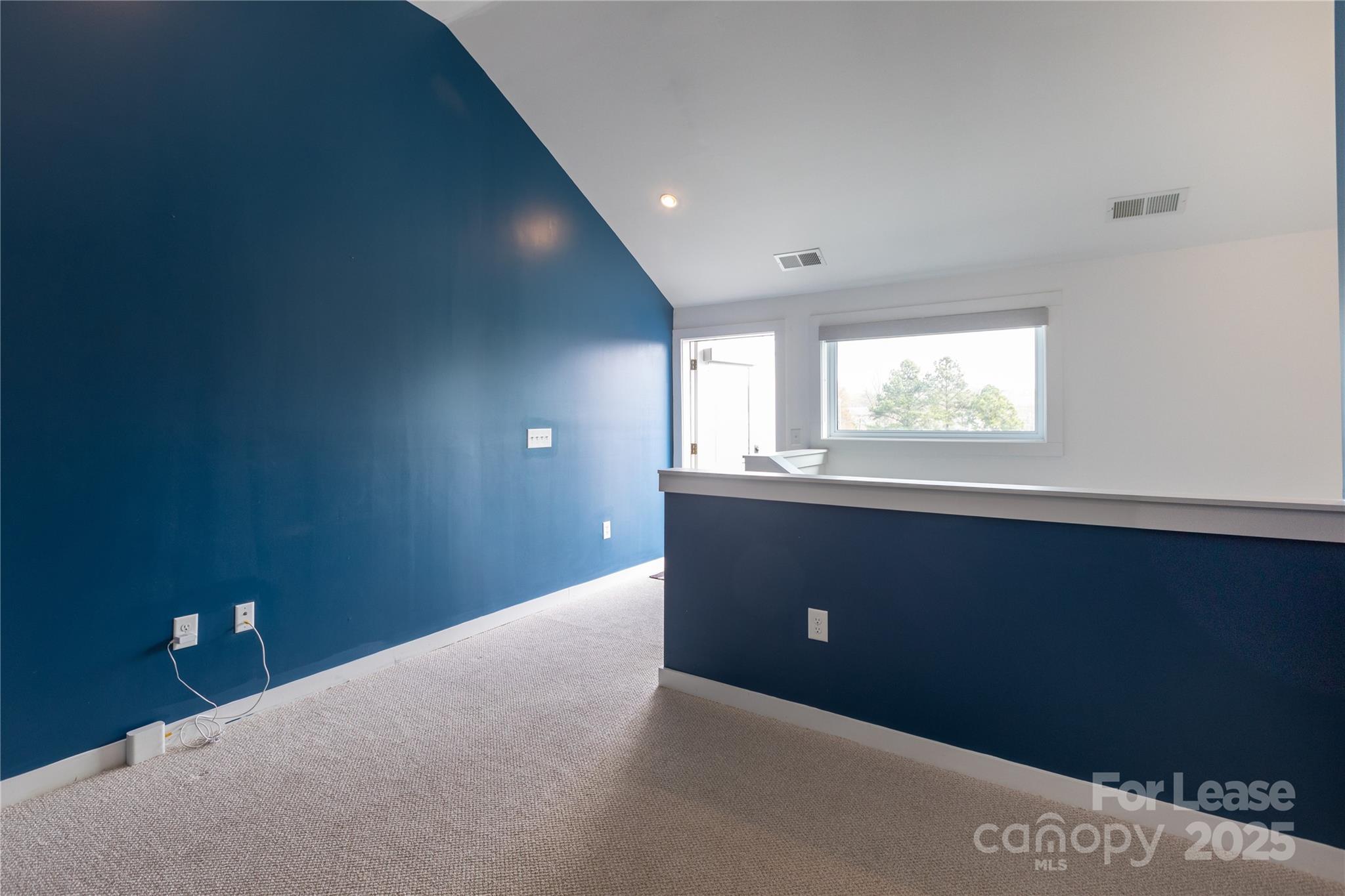 2649 Shenandoah Avenue Charlotte, NC 28205 - Photo 24 of 37 a view of an empty room with a window