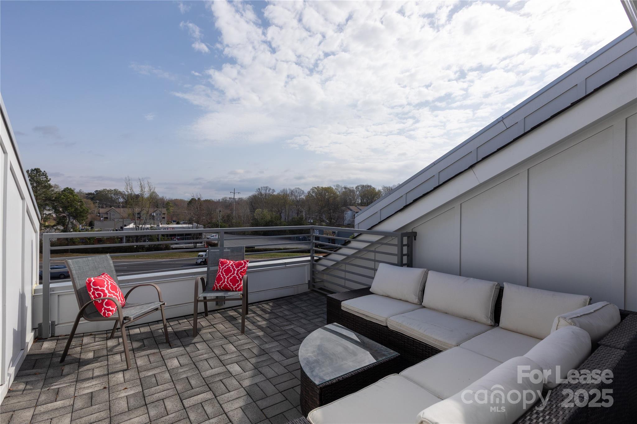 2649 Shenandoah Avenue Charlotte, NC 28205 - Photo 28 of 37 a roof deck with a couch and chairs