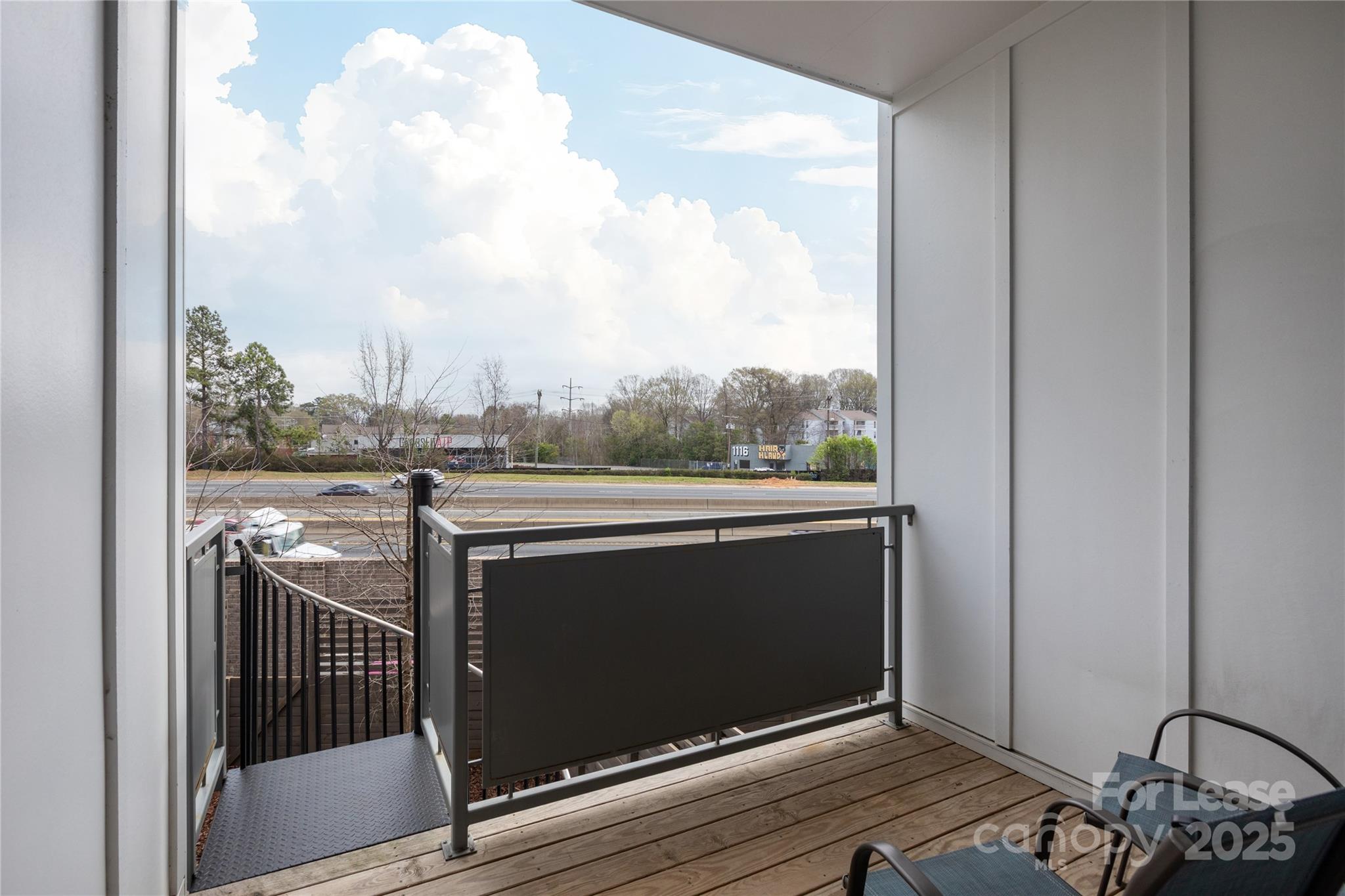 2649 Shenandoah Avenue Charlotte, NC 28205 - Photo 32 of 37 a view of balcony and wooden floor