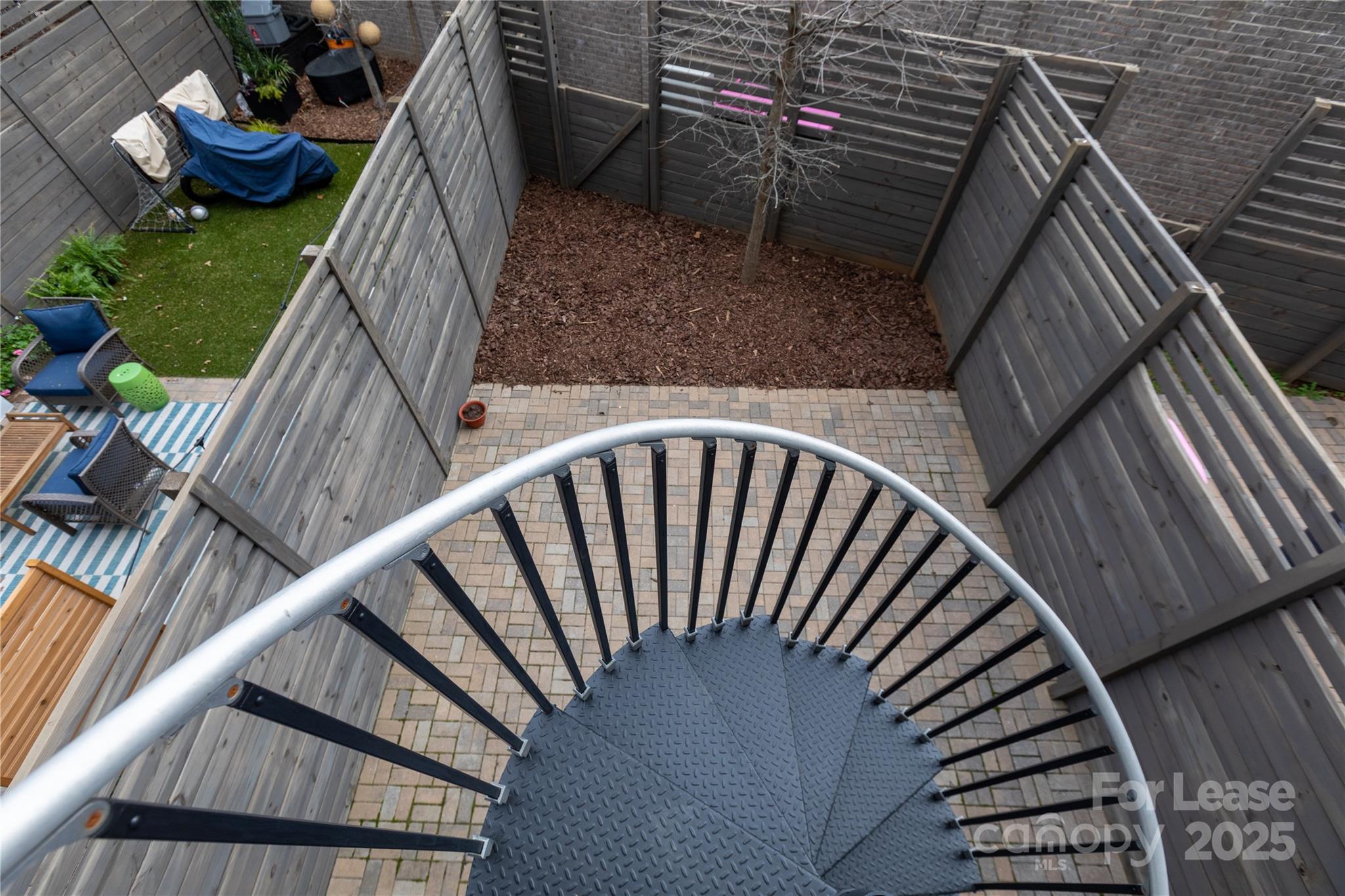 2649 Shenandoah Avenue Charlotte, NC 28205 - Photo 33 of 37 a view of entryway and kitchen with wooden floor