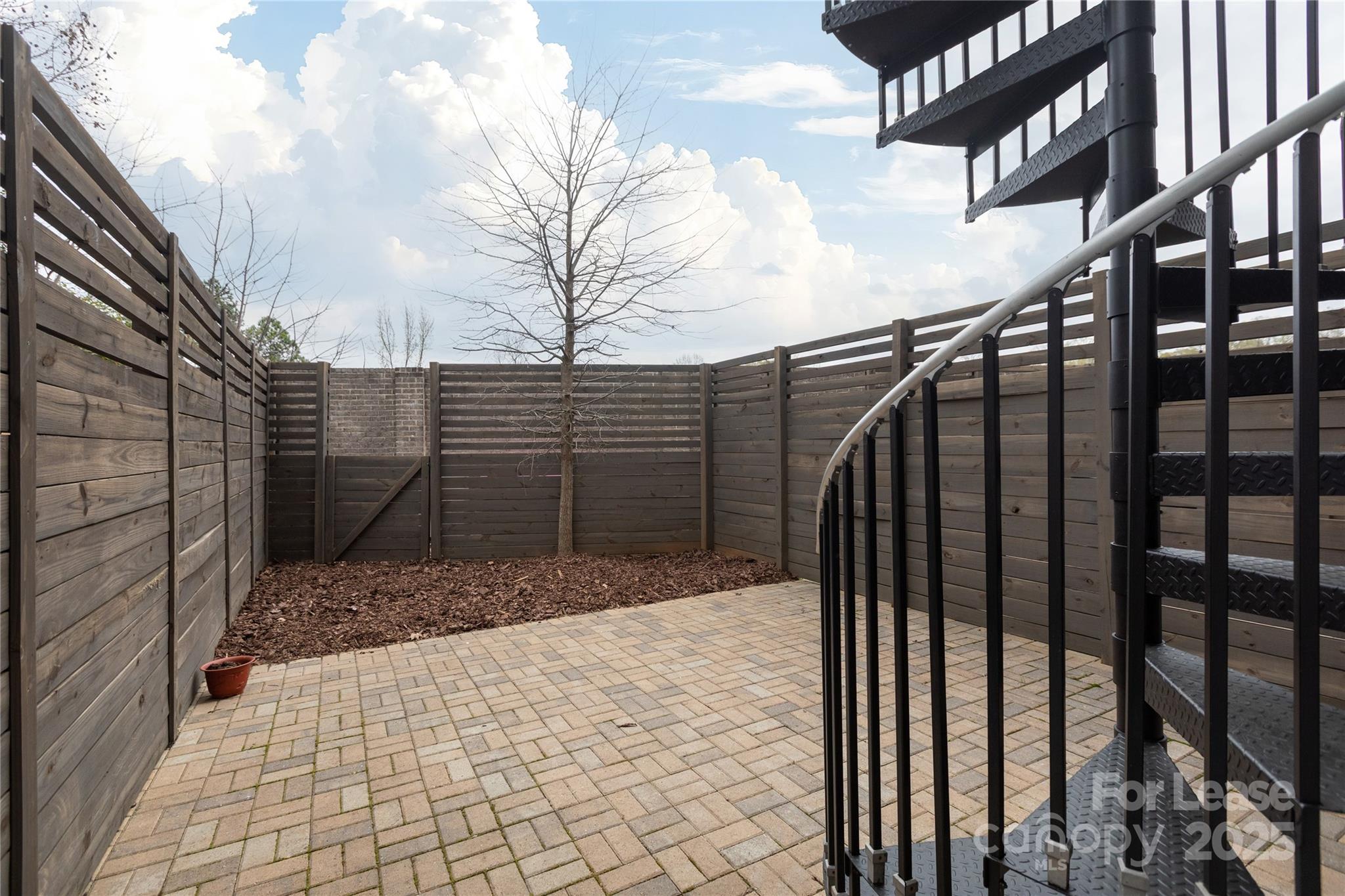 2649 Shenandoah Avenue Charlotte, NC 28205 - Photo 34 of 37 a view of street along with wooden fence