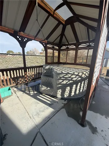 a view of a chairs and table in the roof