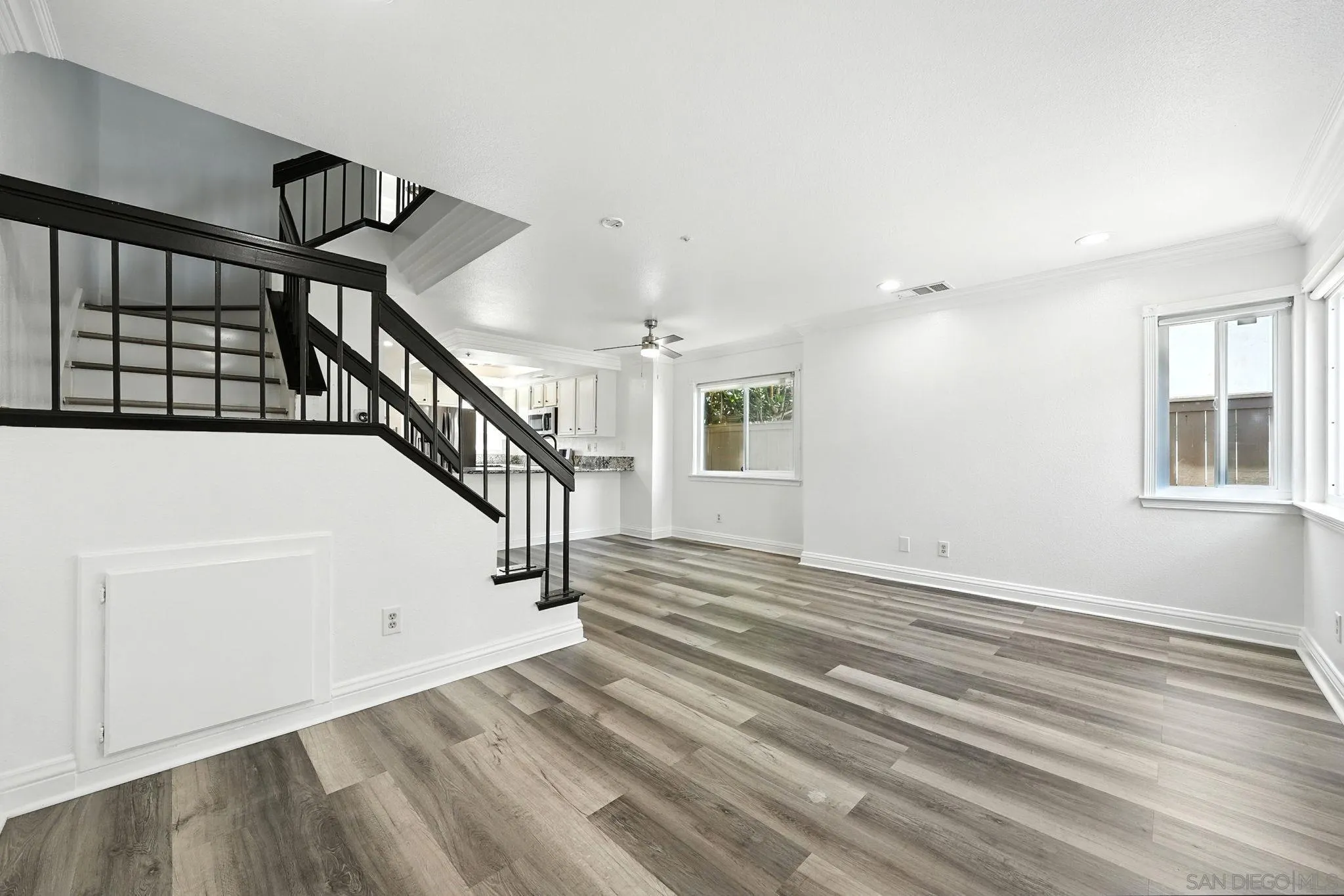 2256 Kings View Circle Spring Valley, CA 91977 - Photo 11 of 35 a view of entryway and hall with wooden floor