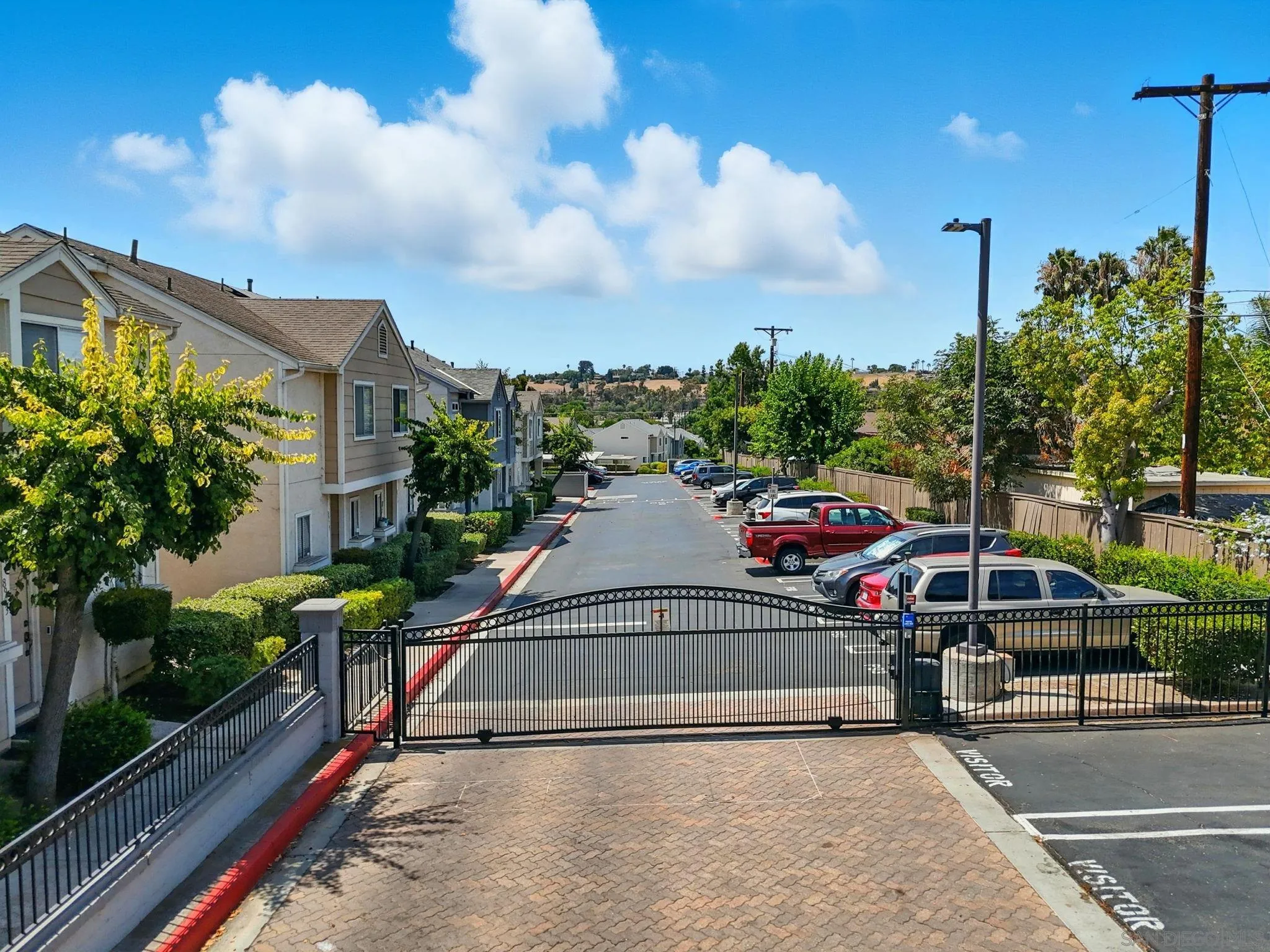 2256 Kings View Circle Spring Valley, CA 91977 - Photo 31 of 35 a view of a street with houses on both side