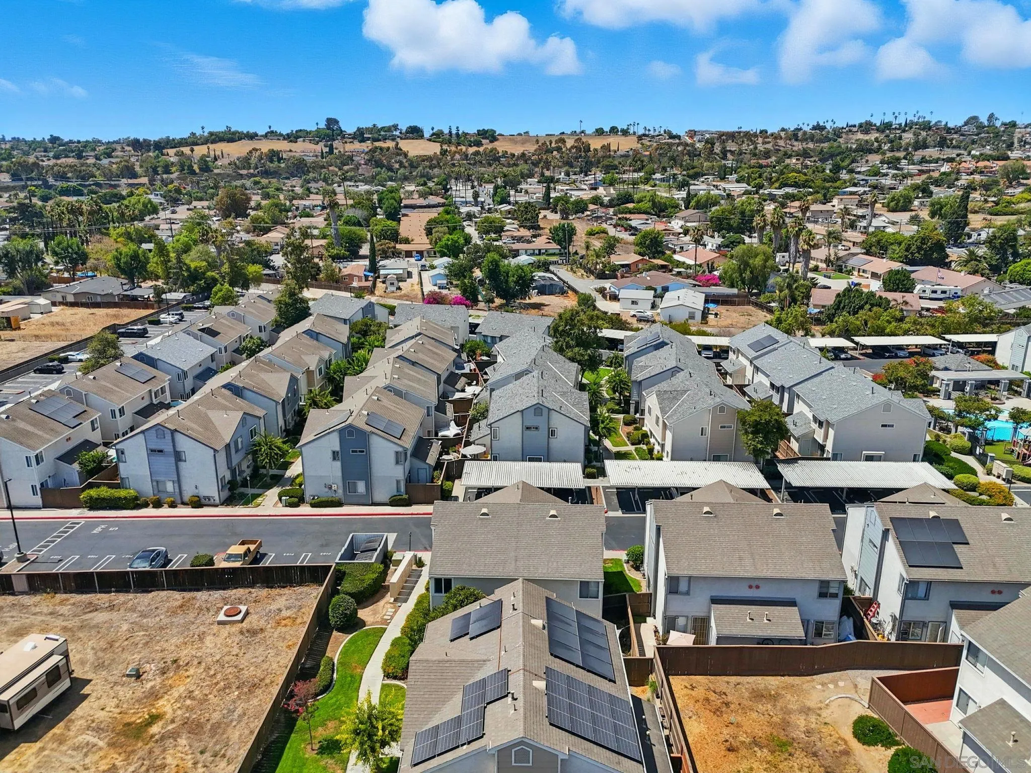 2256 Kings View Circle Spring Valley, CA 91977 - Photo 32 of 35 an aerial view of residential houses with outdoor space and parking