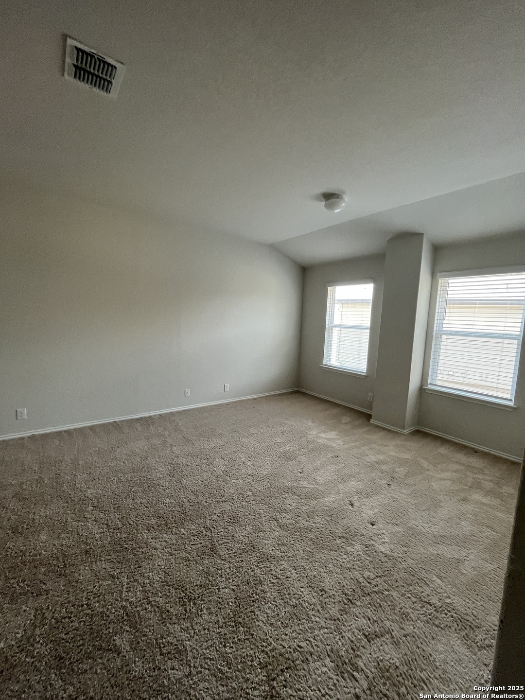 6218 Tadpole Bluff Converse, TX 78109 - Photo 12 of 23 an empty room with windows