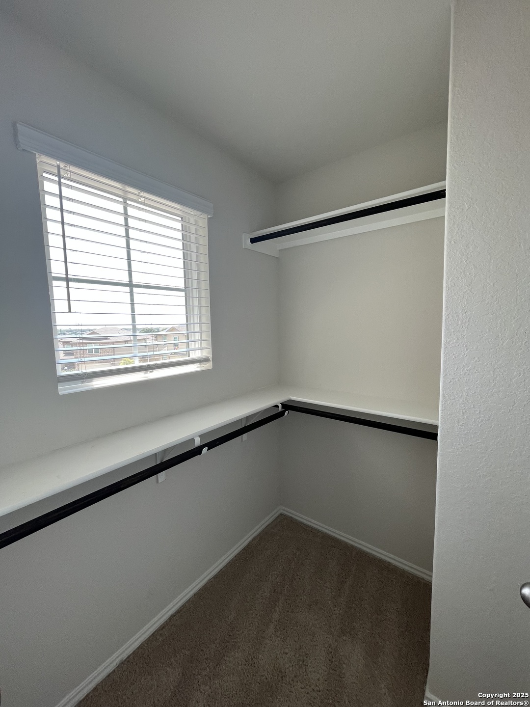 6218 Tadpole Bluff Converse, TX 78109 - Photo 19 of 23 a view of an empty room with a window