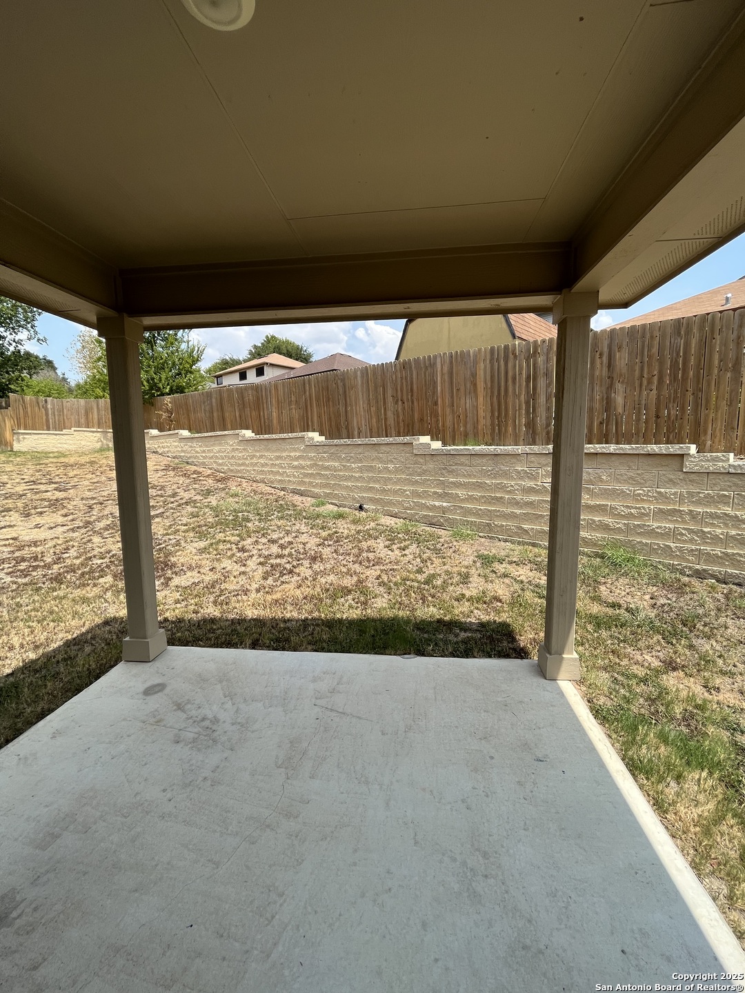 6218 Tadpole Bluff Converse, TX 78109 - Photo 22 of 23 a view of a room with wooden floor and a ceiling fan
