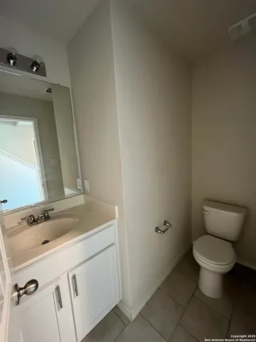 a bathroom with a sink and toilet
