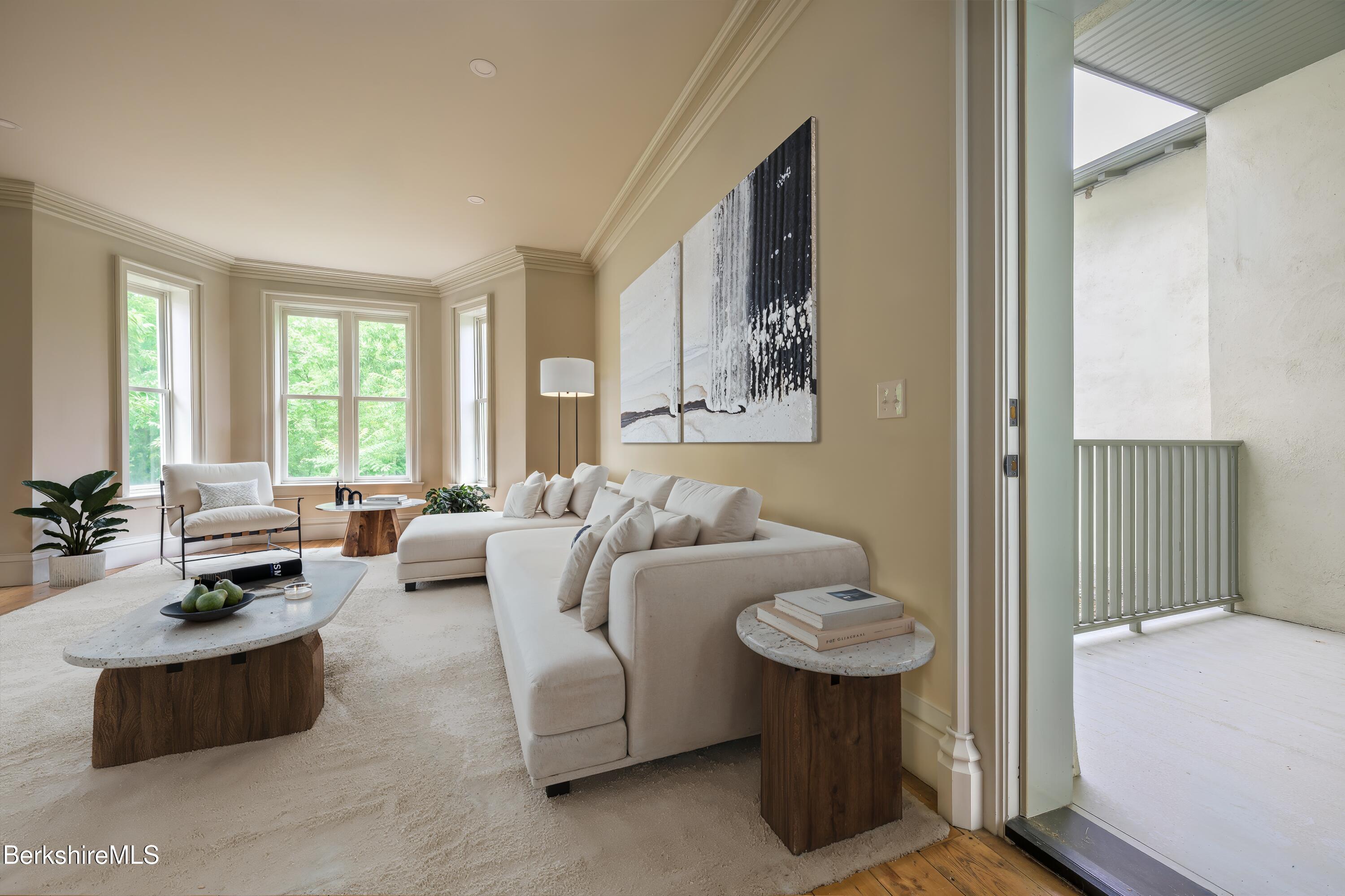 59 Allen Street Hudson, NY 12534 - Photo 16 of 59 a living room with furniture and a large window