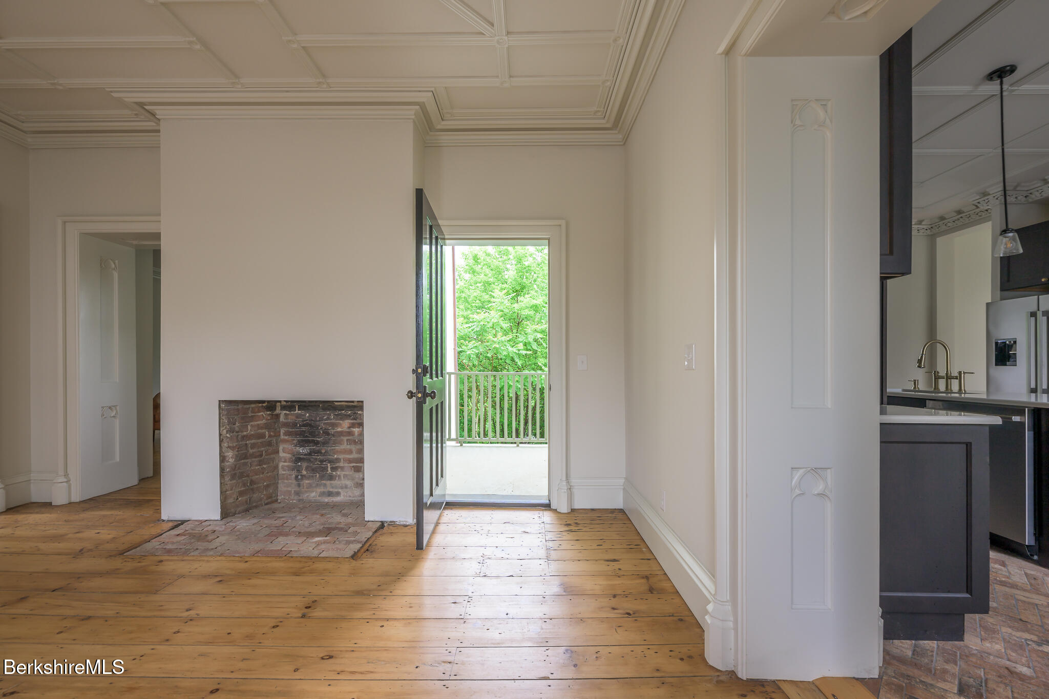 59 Allen Street Hudson, NY 12534 - Photo 21 of 59 a view of an empty room with a fireplace and a window