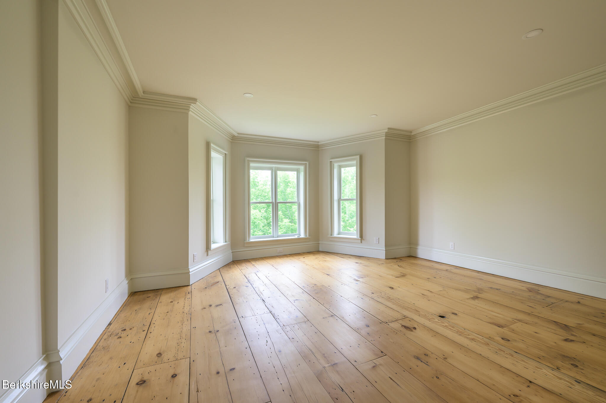 59 Allen Street Hudson, NY 12534 - Photo 31 of 59 a view of an empty room with wooden floor and a window