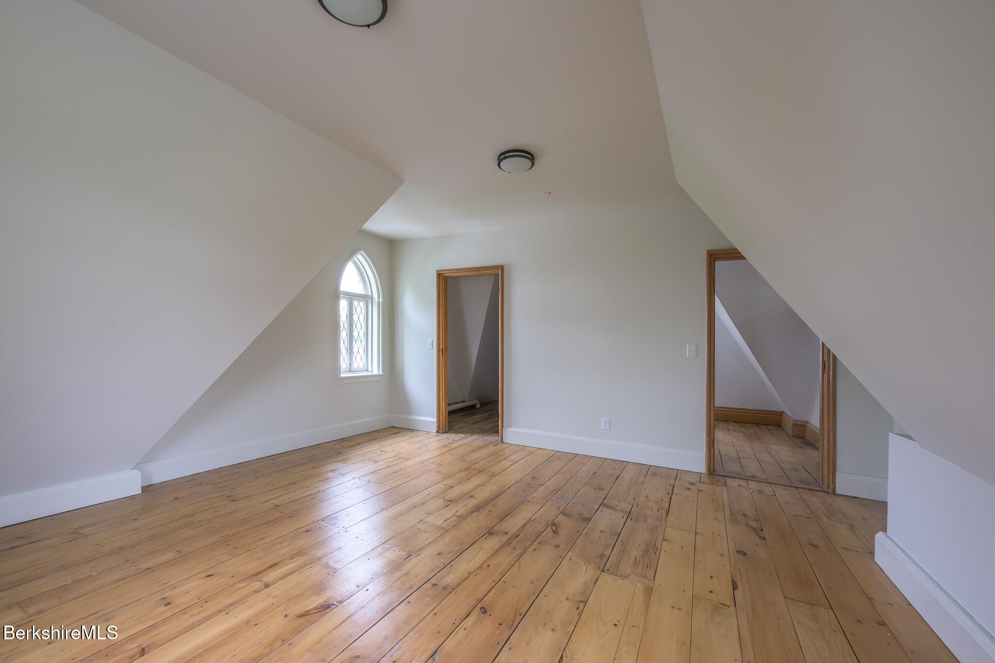 59 Allen Street Hudson, NY 12534 - Photo 50 of 59 a view of a hallway view with wooden floor and staircase
