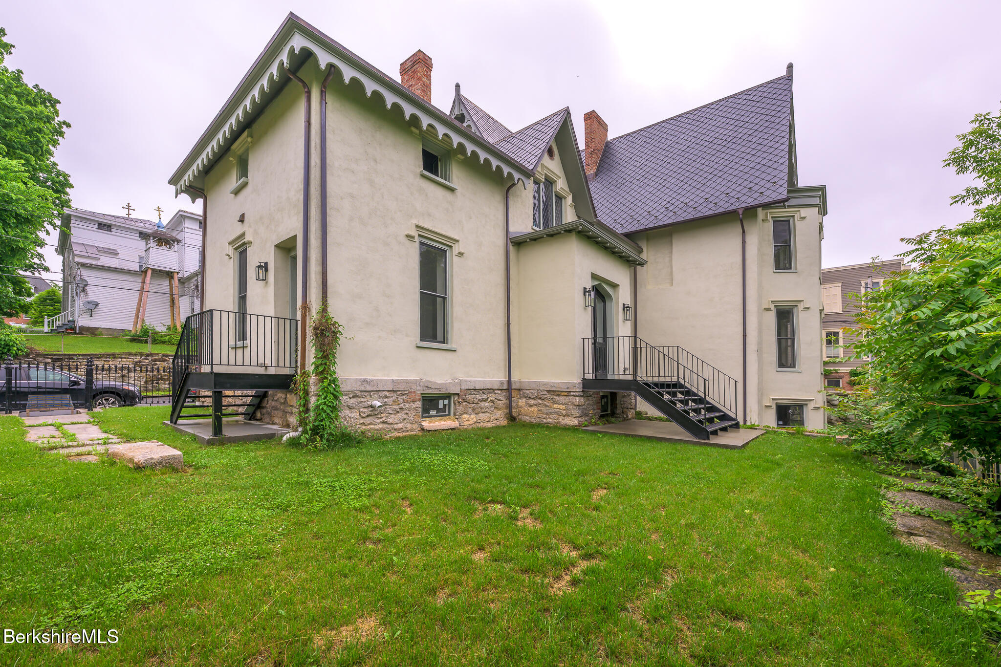 59 Allen Street Hudson, NY 12534 - Photo 5 of 59 a view of a house with a yard and sitting area