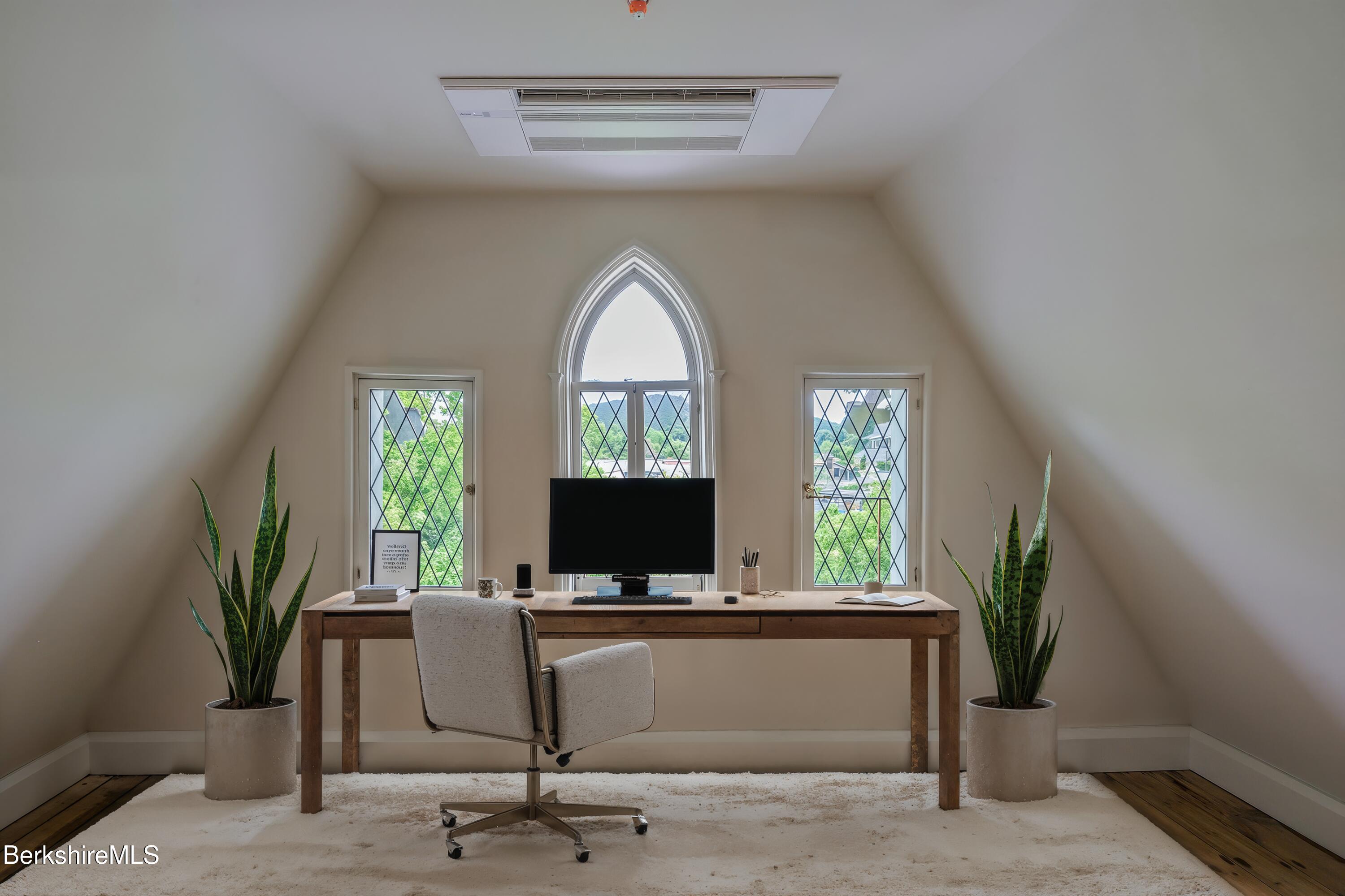 59 Allen Street Hudson, NY 12534 - Photo 54 of 59 a view of workspace with a window and wooden floor