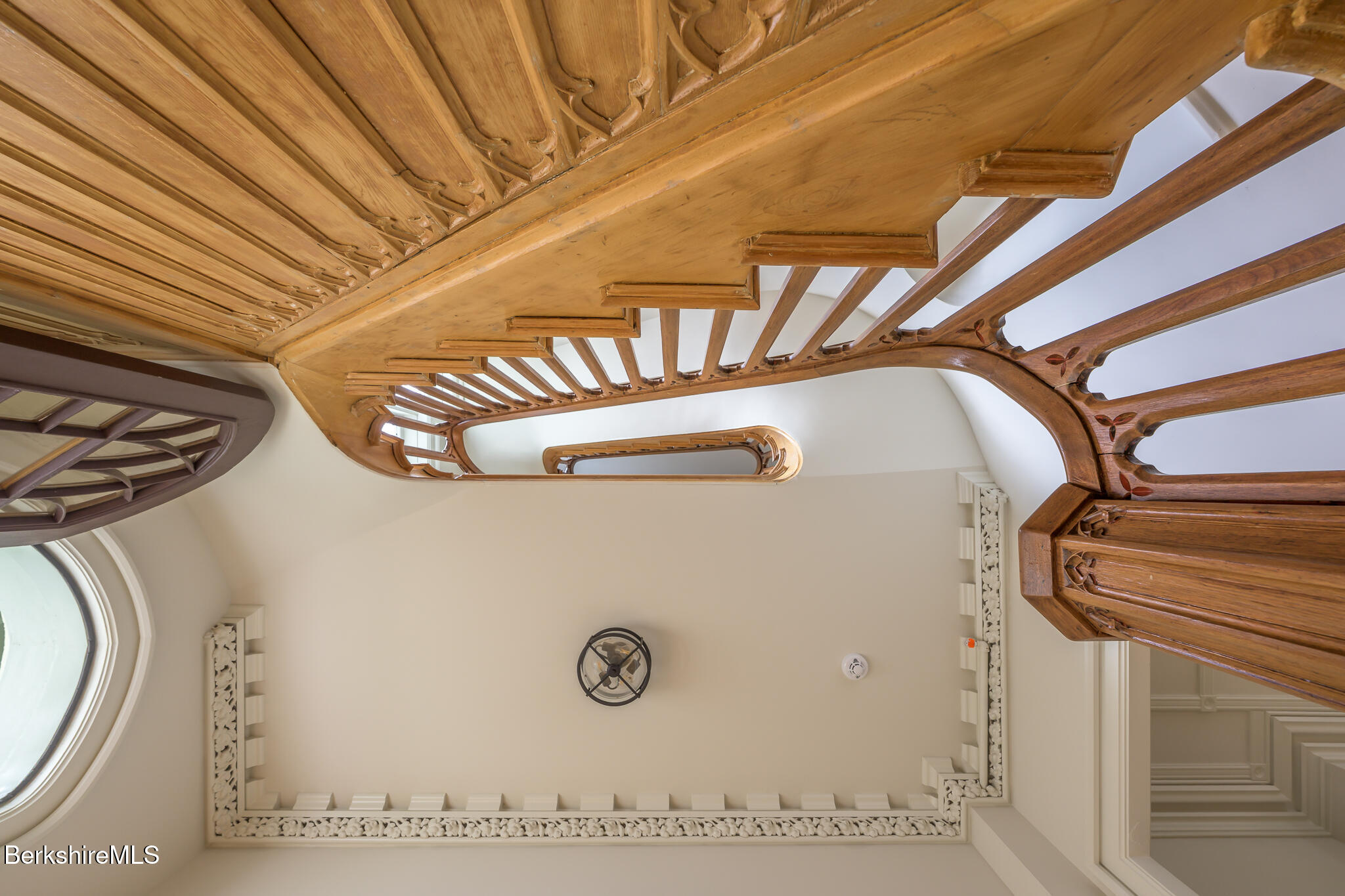 59 Allen Street Hudson, NY 12534 - Photo 57 of 59 a view of a garage with a large tree