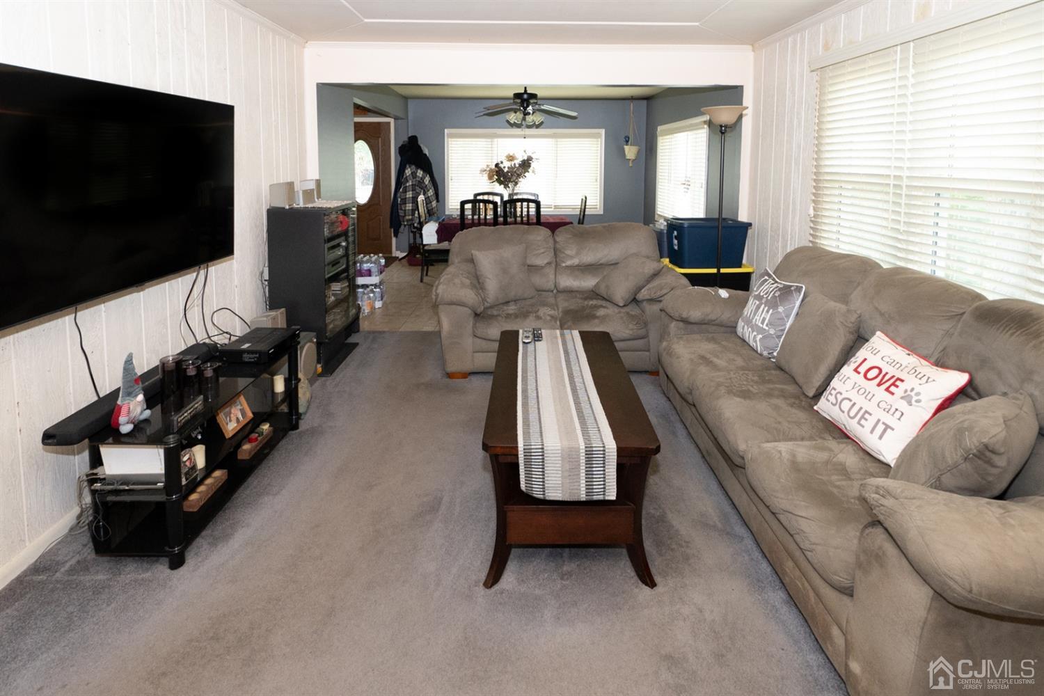 189 Texas Road Old Bridge, NJ 08857 - Photo 14 of 35 a living room with furniture and a flat screen tv