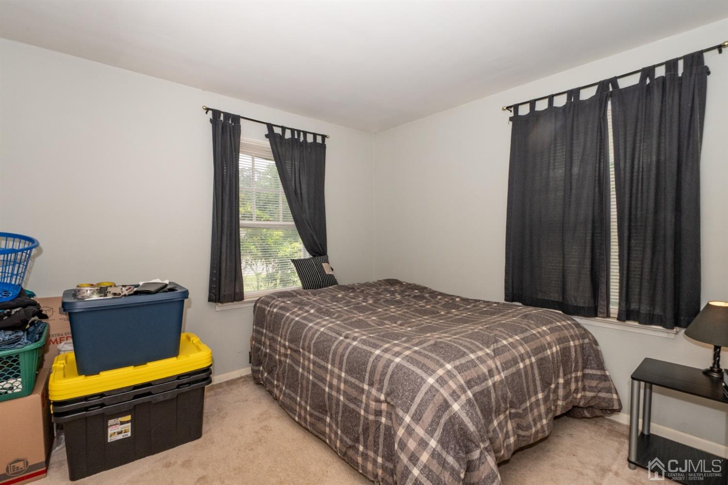 189 Texas Road Old Bridge, NJ 08857 - Photo 17 of 35 a bedroom with a bed and a window