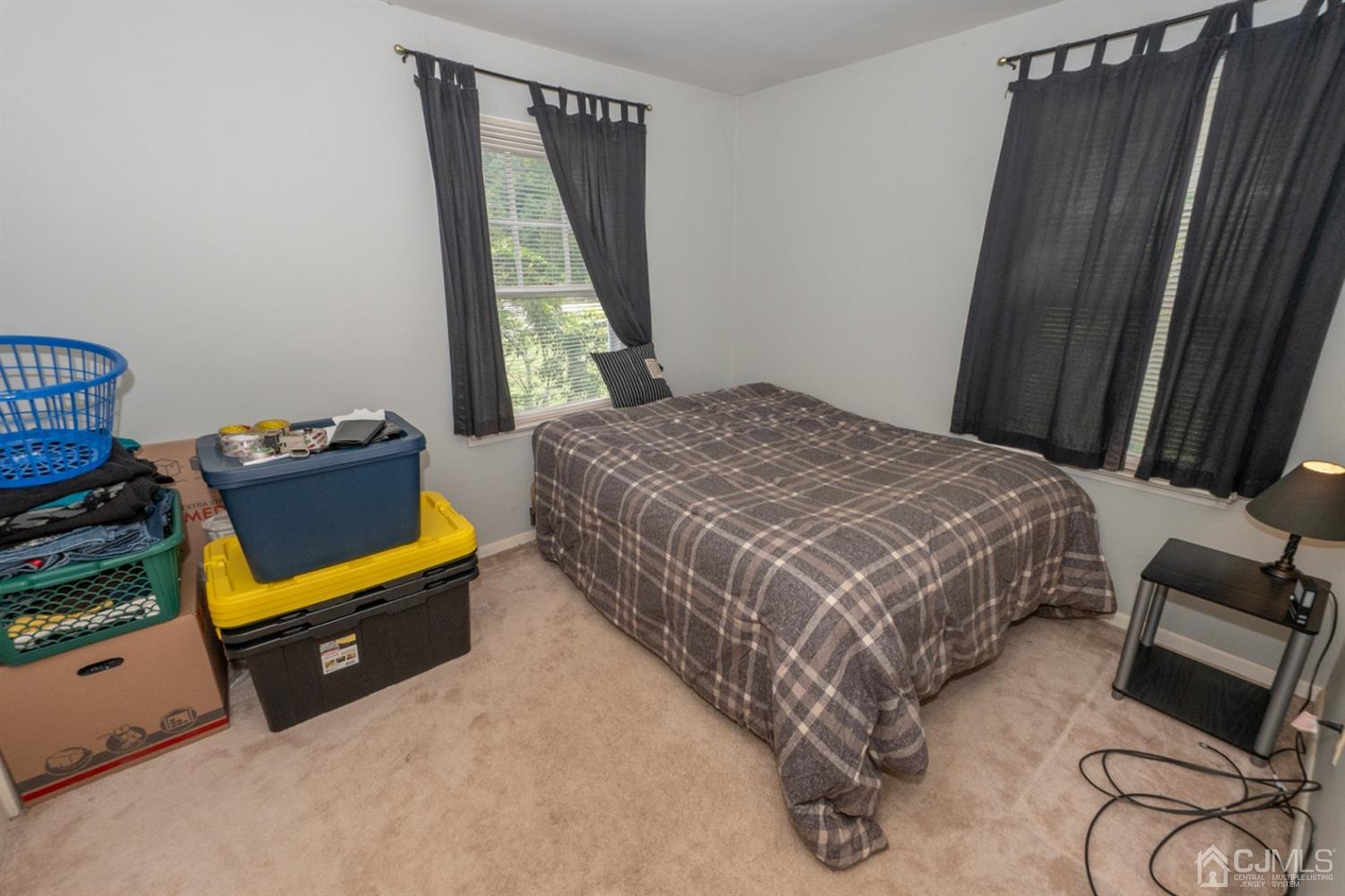 189 Texas Road Old Bridge, NJ 08857 - Photo 18 of 35 a bedroom with a bed and a window