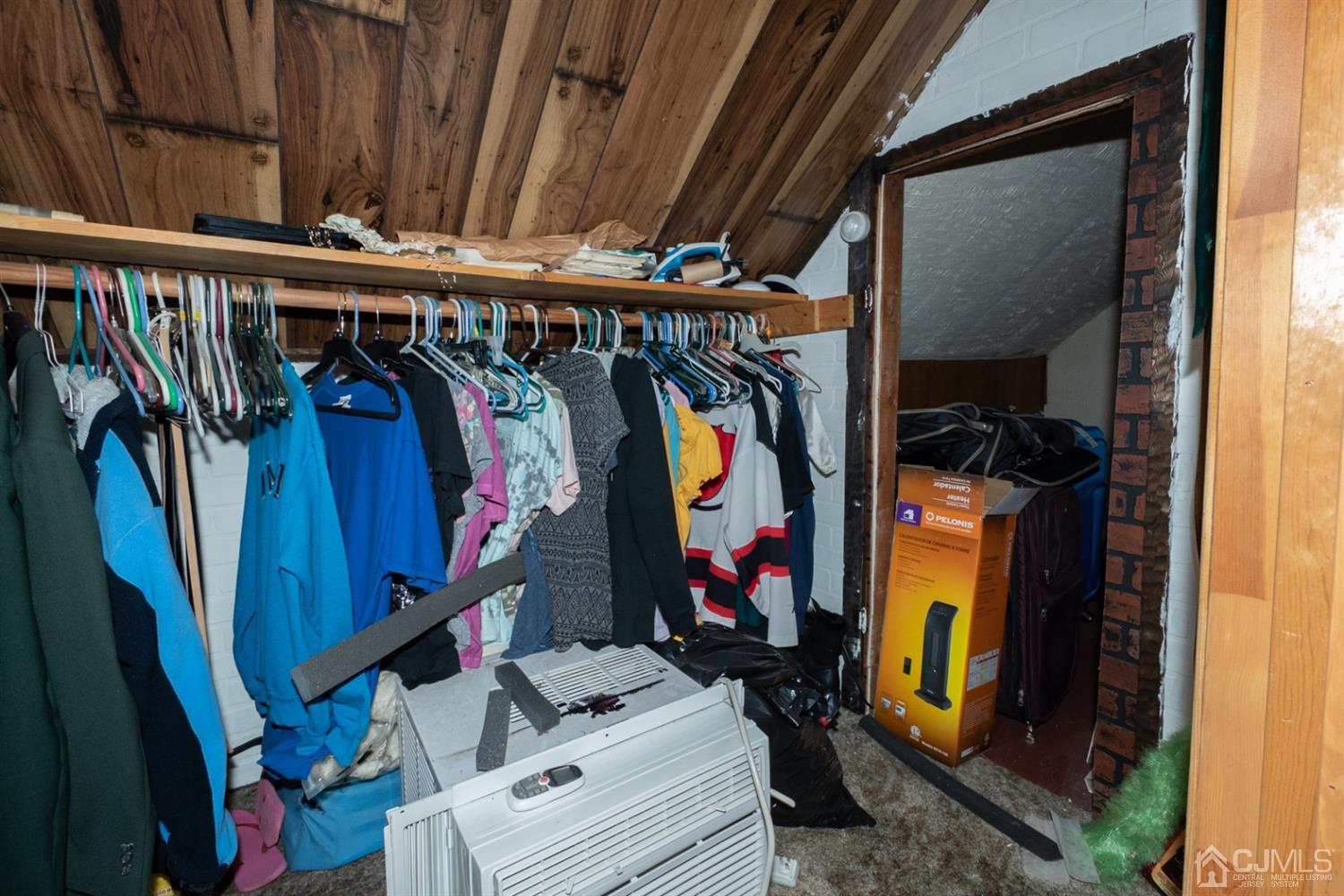 189 Texas Road Old Bridge, NJ 08857 - Photo 23 of 35 a view of walk in closet with clothes and shoes