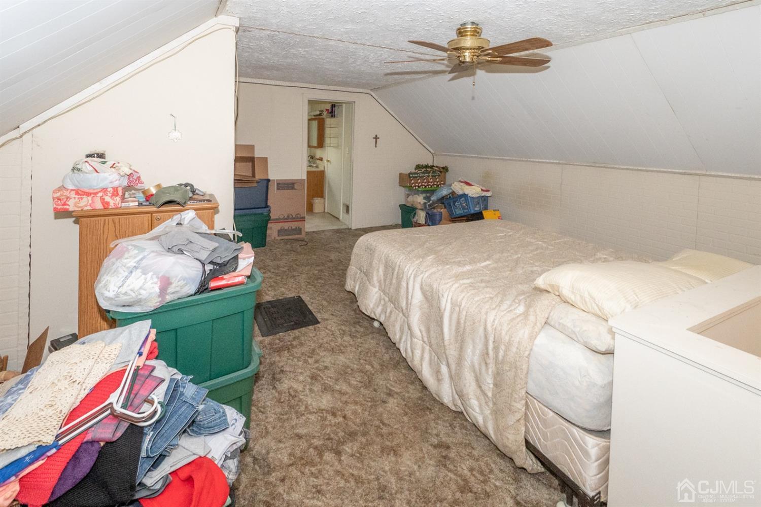189 Texas Road Old Bridge, NJ 08857 - Photo 28 of 35 a bedroom with bed and a chandelier