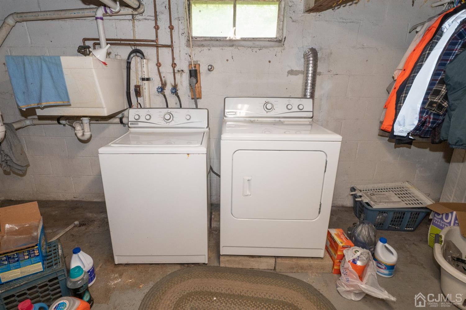 189 Texas Road Old Bridge, NJ 08857 - Photo 32 of 35 a utility room with dryer and washer