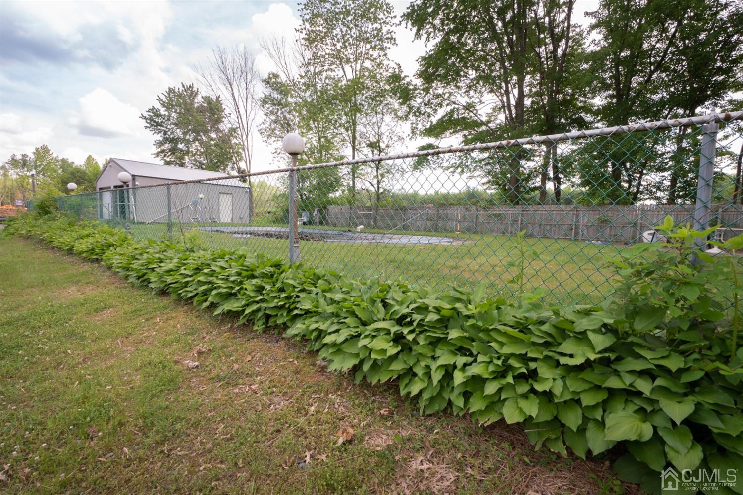 189 Texas Road Old Bridge, NJ 08857 - Photo 33 of 35 a backyard of a house with lots of green space