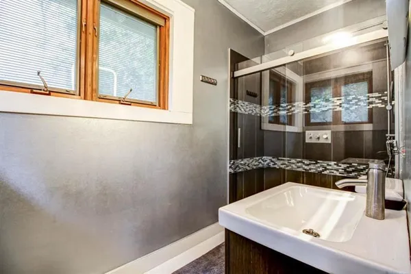 a view of kitchen and sink